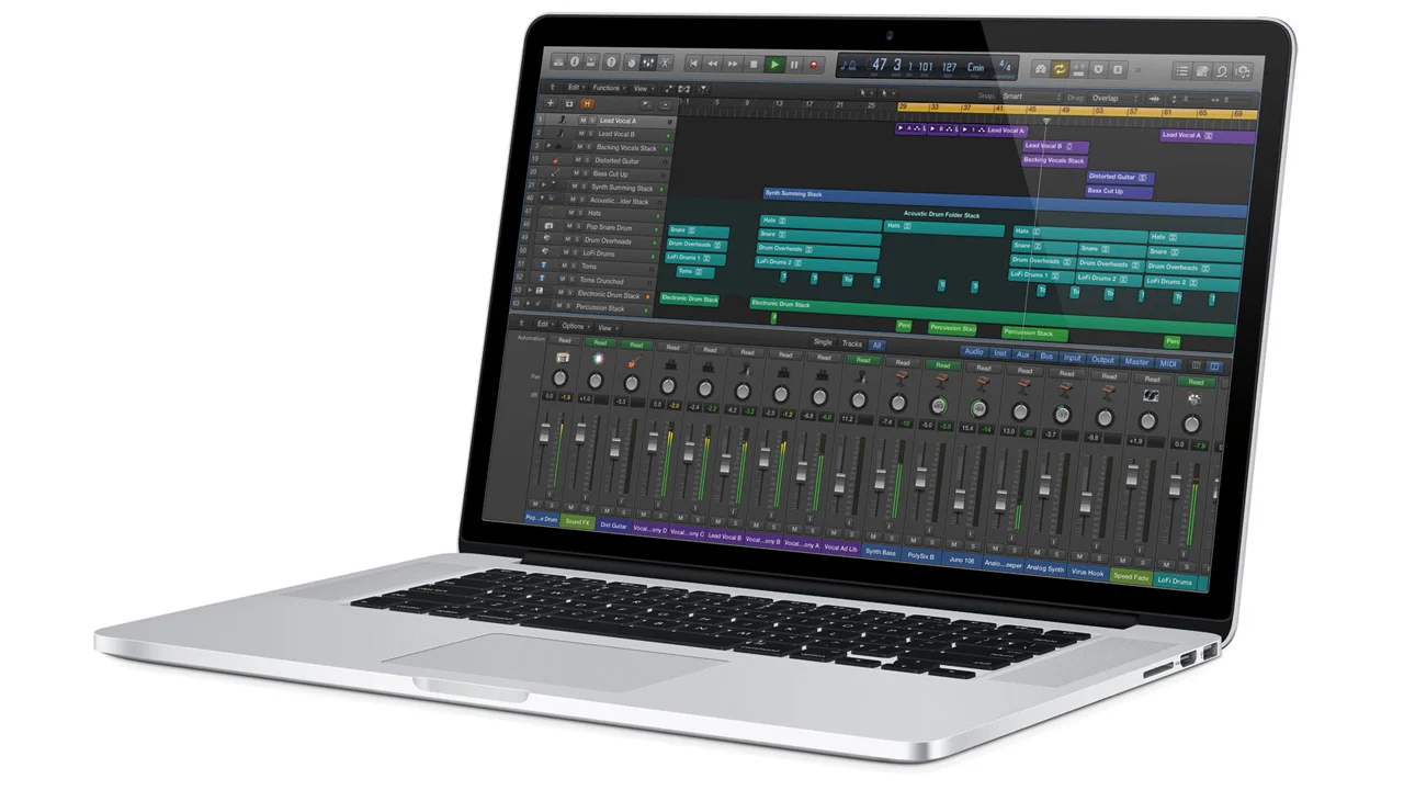 MacBook Pro running Logic Pro for multi-track audio recording and post-production edits