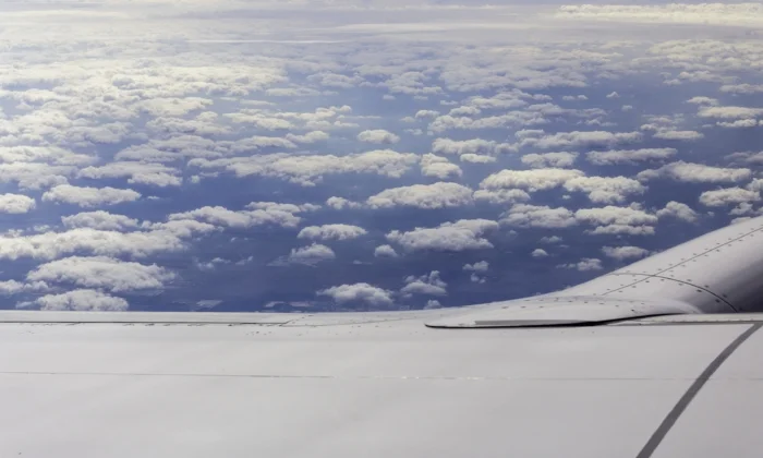 "Bec does Georgia O'Keeffe" (c) Rebecca LaChance, 2015. Somewhere over the continental U.S. I love to take pictures of the clouds whenever I fly. It reminds me of Georgia O'Keefe's painting "Above the Clouds". I read, a very long time ago, that a sight such as this was the creative spark for her cloud series.