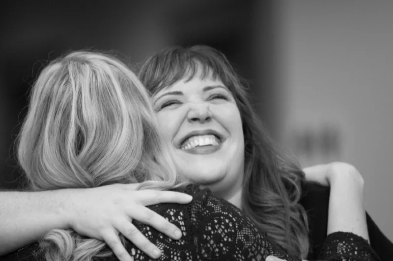 The woman smiling is one of the daughters of the decedent. This is the kind of stuff I love about compassion photography. Yes, there are loads of tough emotions. There are also moments like this that are so full of love they nearly burst.