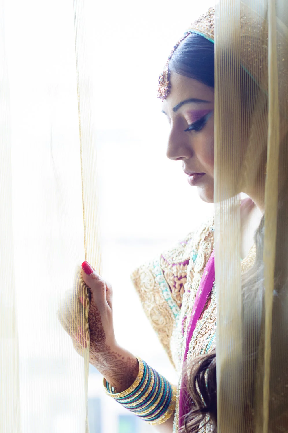 I'm especially pleased and appreciative as the standard of portraits is so high in this group. I was asked how I achieved the ethereal, light look in this image. The answer is simple - I asked the bride to stand by the window (it was a bright day) and use the curtains as an accessory. By exposing for the bride's face I ensured that the background light would be very bright, giving me the very bright look that I wanted. The rest was to a case of trying a few different poses - all worked out well but this is the one that really grabbed me, deep and contemplative on her big day. Please feel free to look at more of my Western and Asian wedding images. I'm now taking bookings for 2016 weddings so please feel free to get in touch via the Contact Me page - let's have a conversation about how I can capture your big day in the most memorable way possible. Thanks for reading, Mo