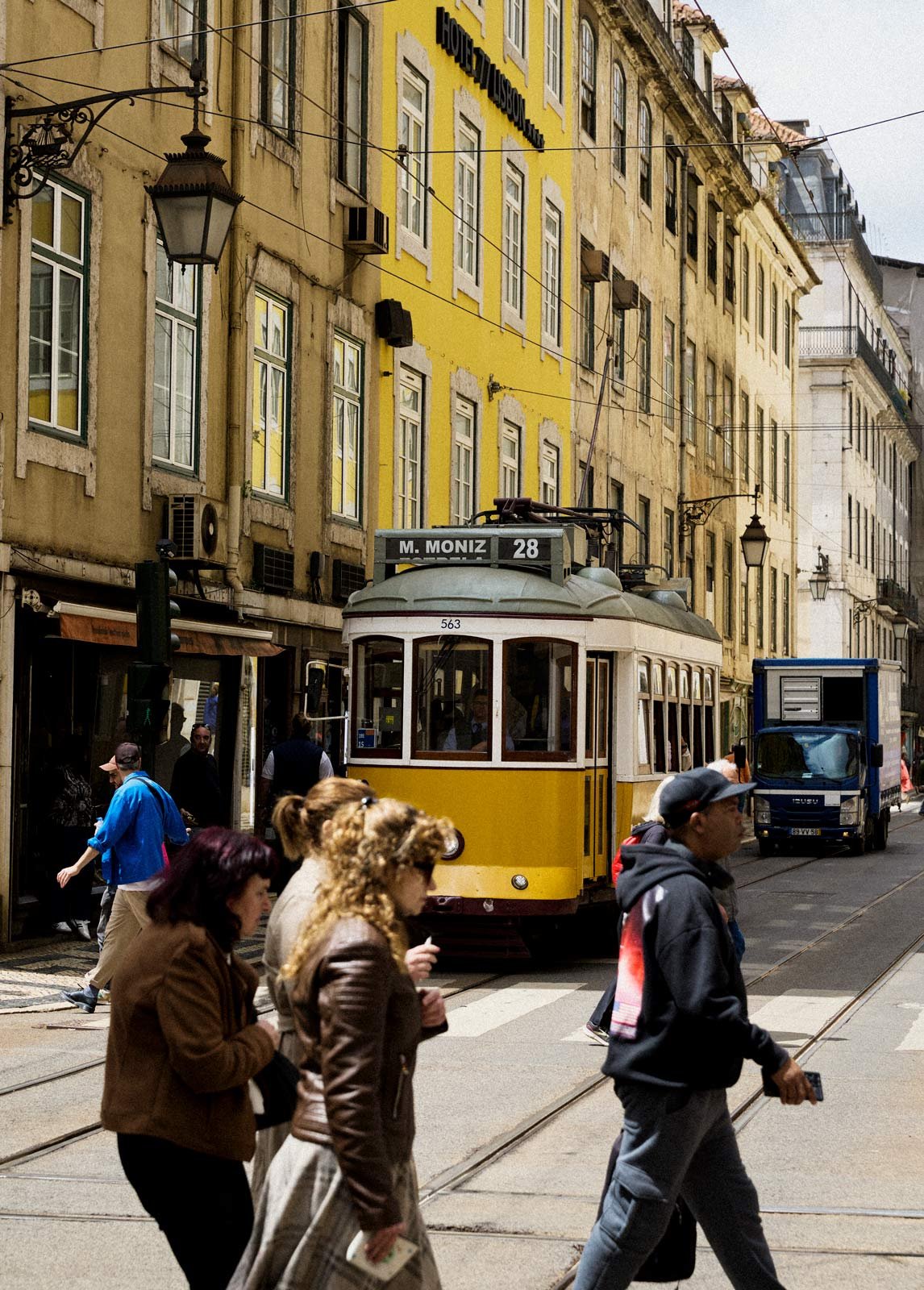 A streetcar is downtown Lisbon, Portugal by Erik Melvin.