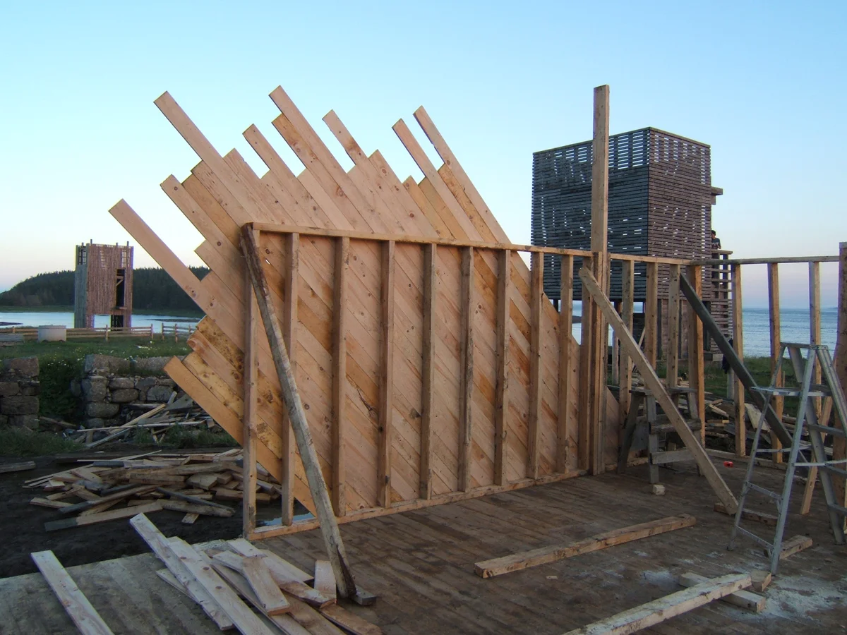 There was no plywood on this job. Every inch was sheathed in 1x6 tongue and groove wood. We sheathed the corners diagonally to help provide a stronger diaphragm. This helps with lateral stability by preventing racking.