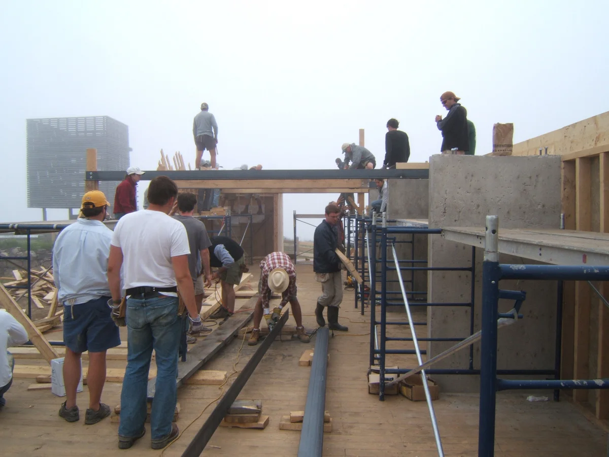 The building materials were wood, concrete and steel. Steel bents were constructed out of steel angles. We built everything in pieces so that we could easily pick things up.