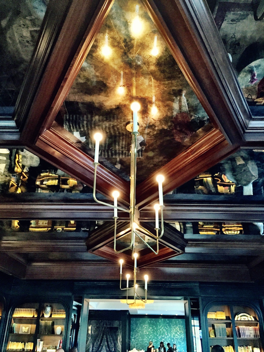 One of the coolest things about the lounge: The Ceiling. Clad with antique mirrors and mahogany beams. How did we hang giant antique mirrors from the ceiling? I can't give away all of the secrets!