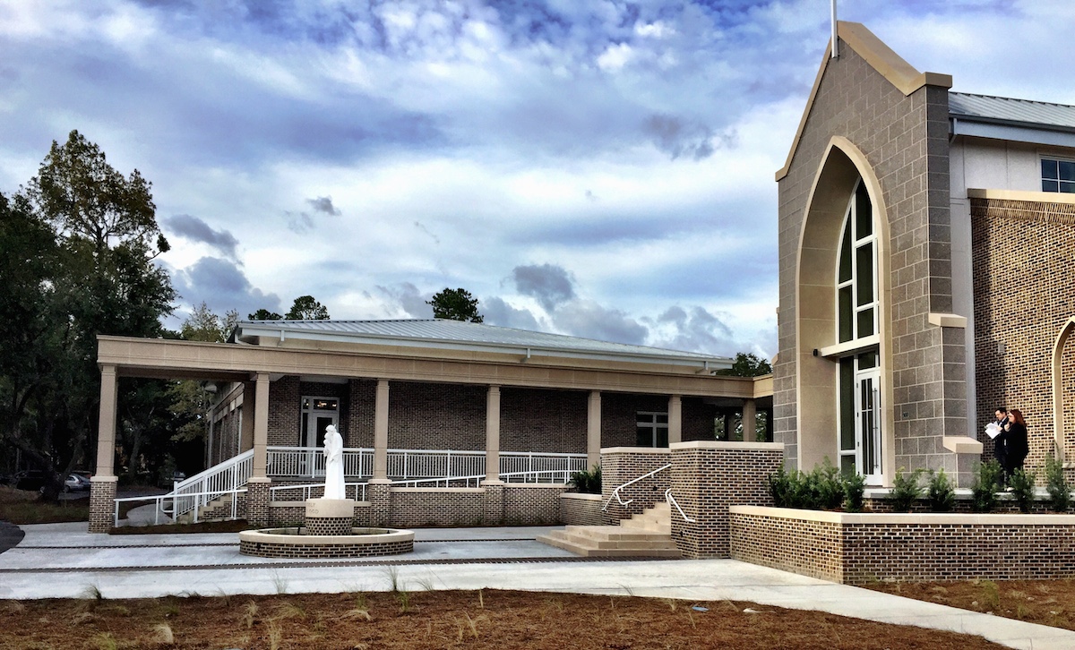 Assembly building to the left. Chapel to the right.