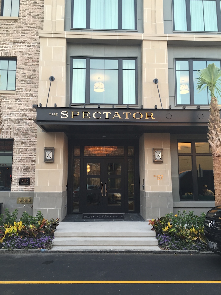 At The Spectator Hotel, we used cast stone for the veneer and the horizontal cornices are GFRC. We got the GFRC manufacturer to match the cast stone color. Can you tell the difference? This project also uses a green coated zinc panel around the windows.
