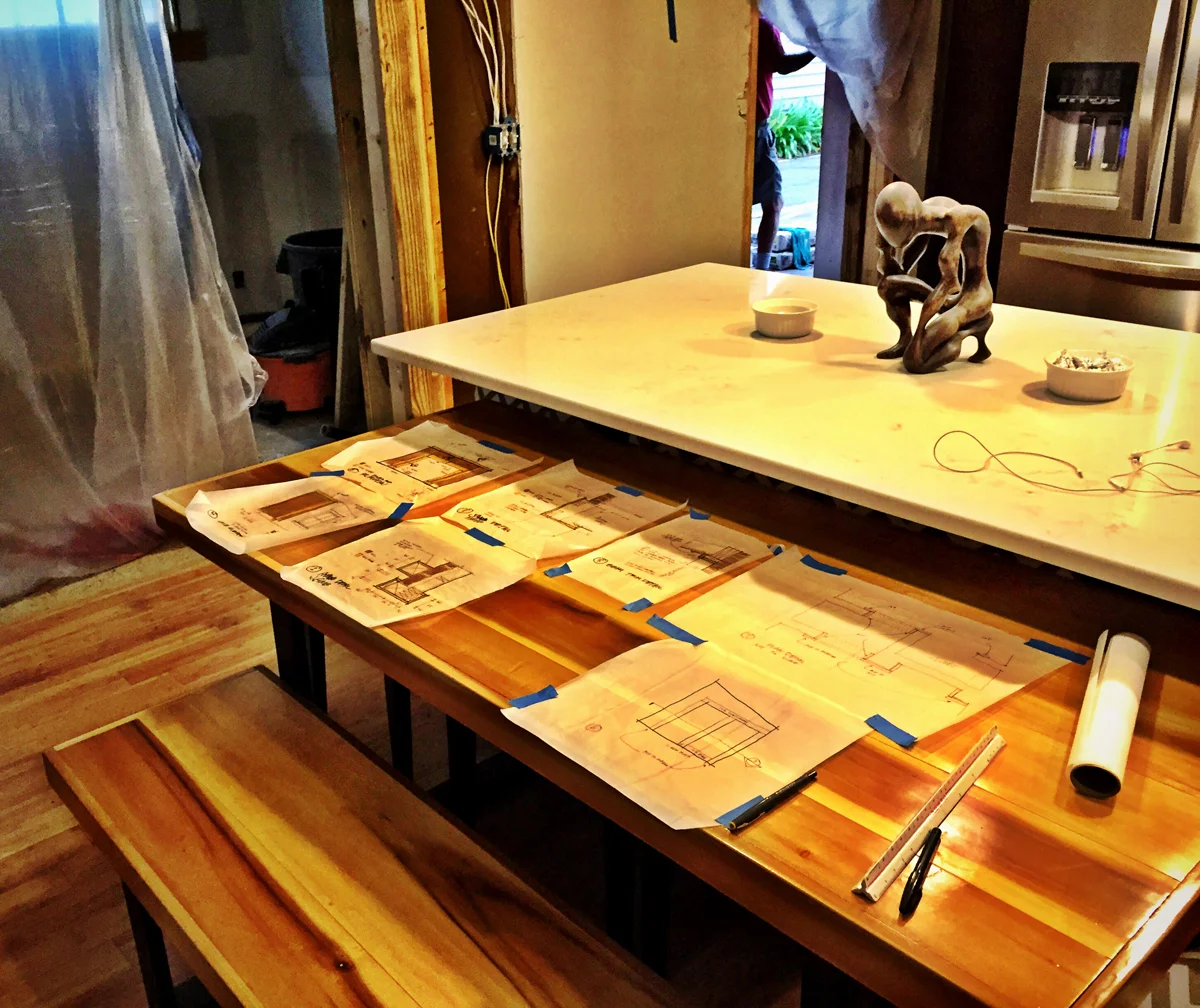 I would leave drawings taped to the kitchen table for the carpenters.