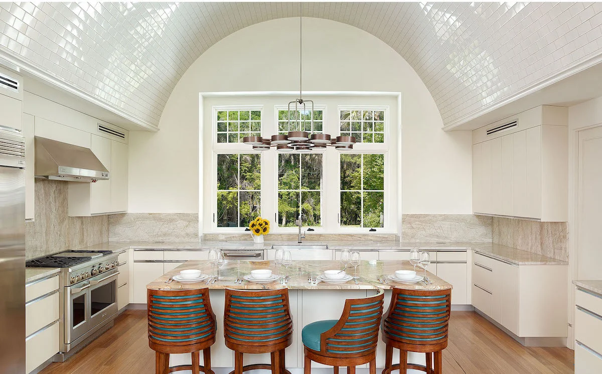 Photo of the kitchen in the Cassique Country Home by Cumulus Architecture + Design LLC.