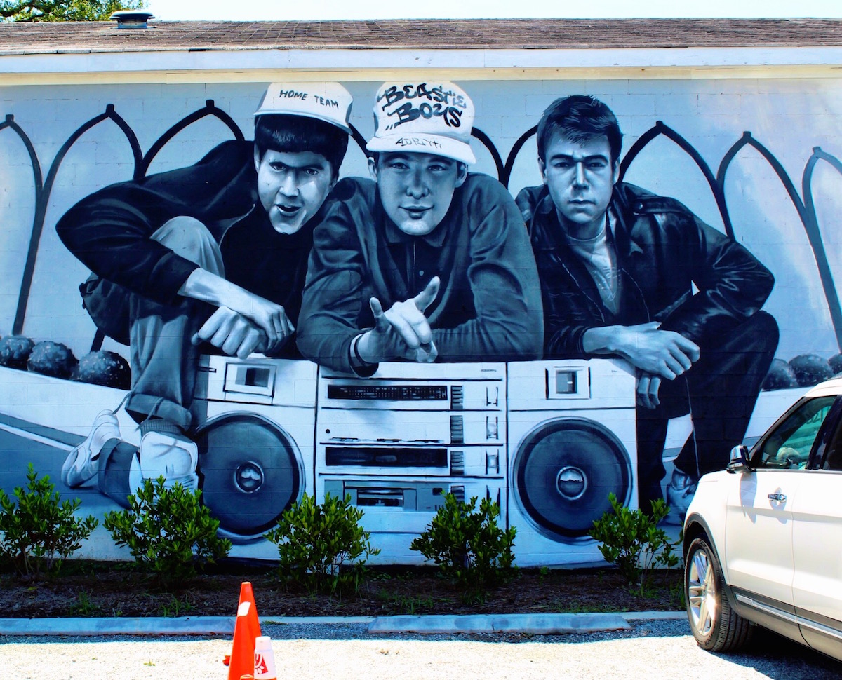 This Beastie Boys mural is painted on the side of one of the Home Team BBQ buildings. The artist is Sérgio Odeith.