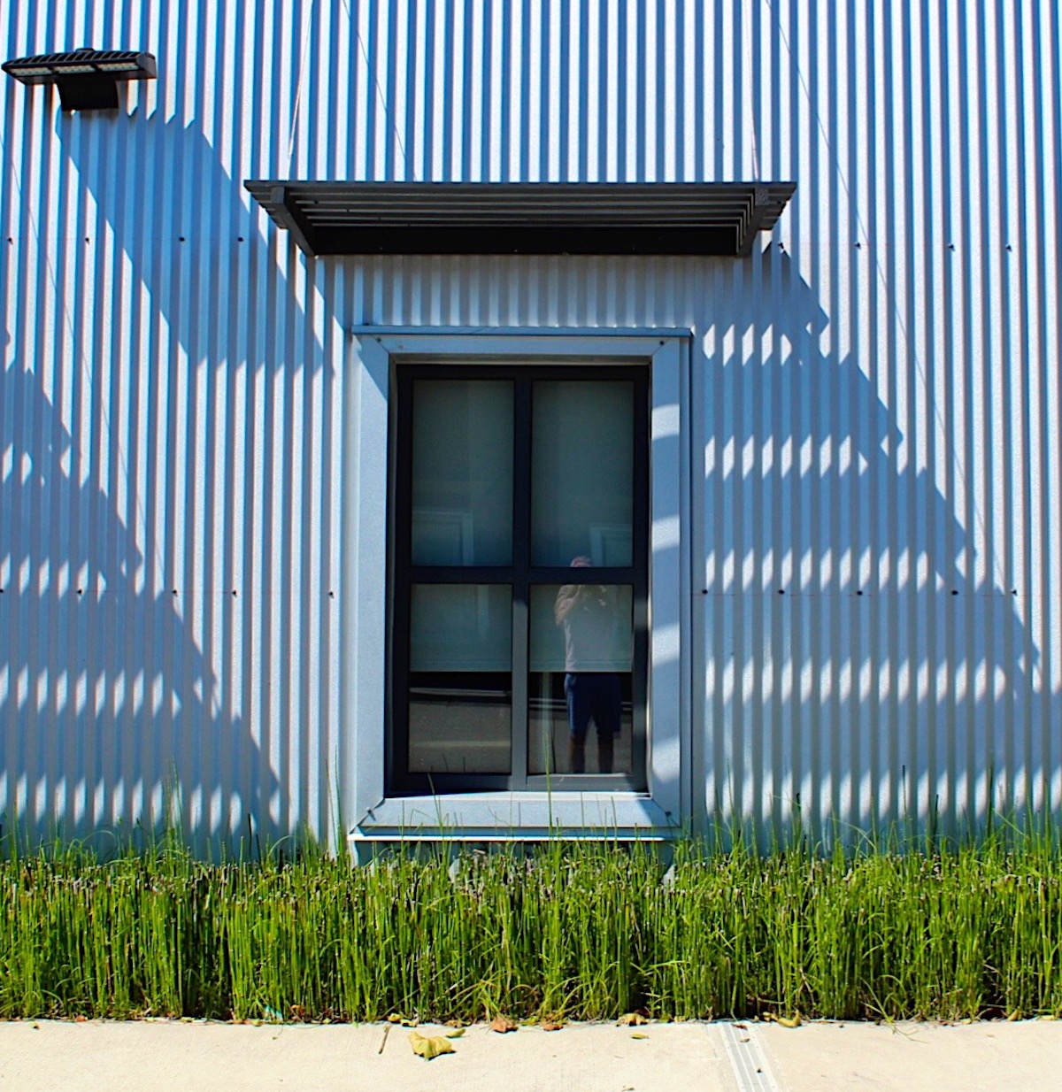The corrugated metal creates an interesting shadow pattern.