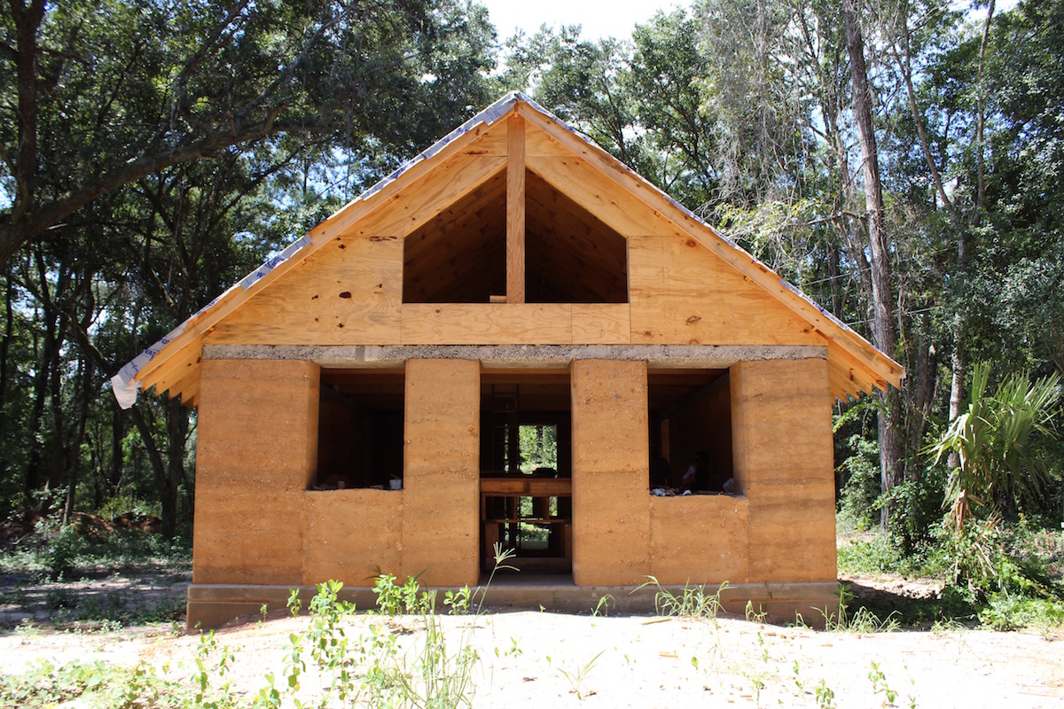 Construction photo of the Walters Residence: Charleston's first Rammed Earth building by April Magill of Root Down Designs. Photo Credit: Danielle Ramos.