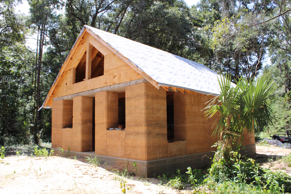 Construction photo of the Walters Residence: Charleston's first Rammed Earth building by April Magill of Root Down Designs. Photo Credit: Danielle Ramos.