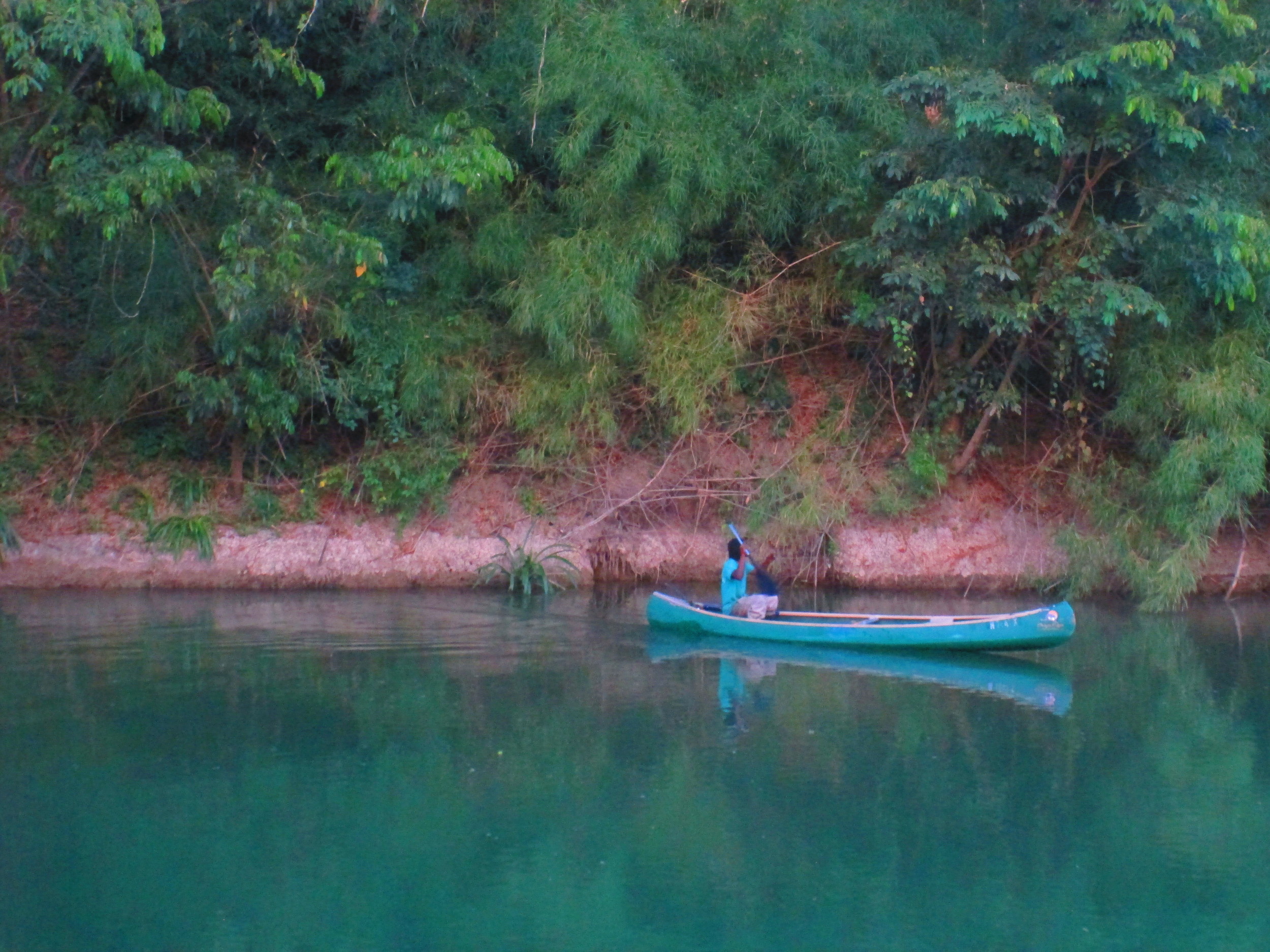 Turqois canoe on Belize River.JPG