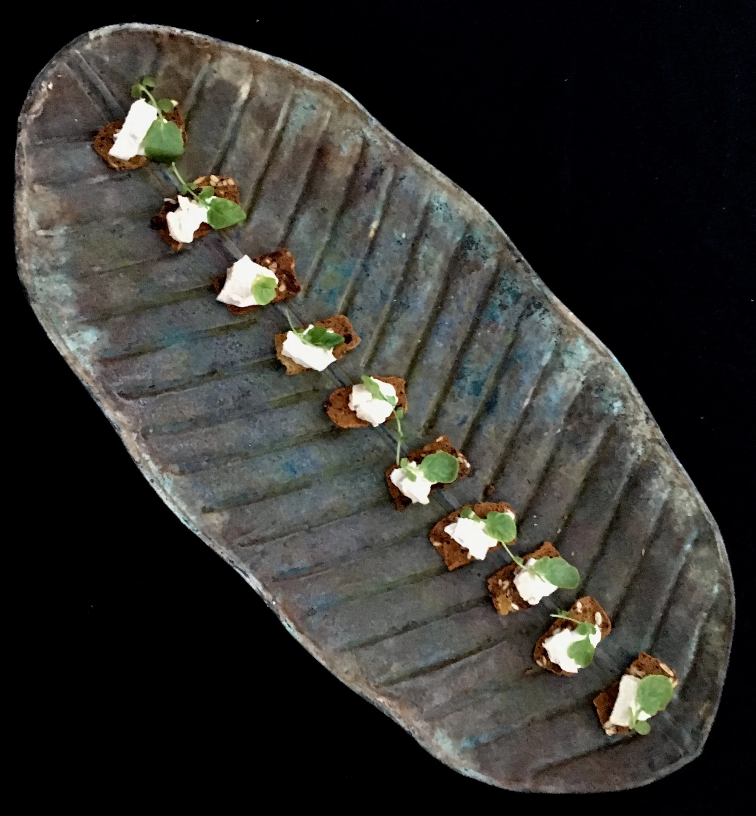 Chicken breast, watercress, cherry blossom green tea infused ricotta , on a dried fruit and seed cracker
