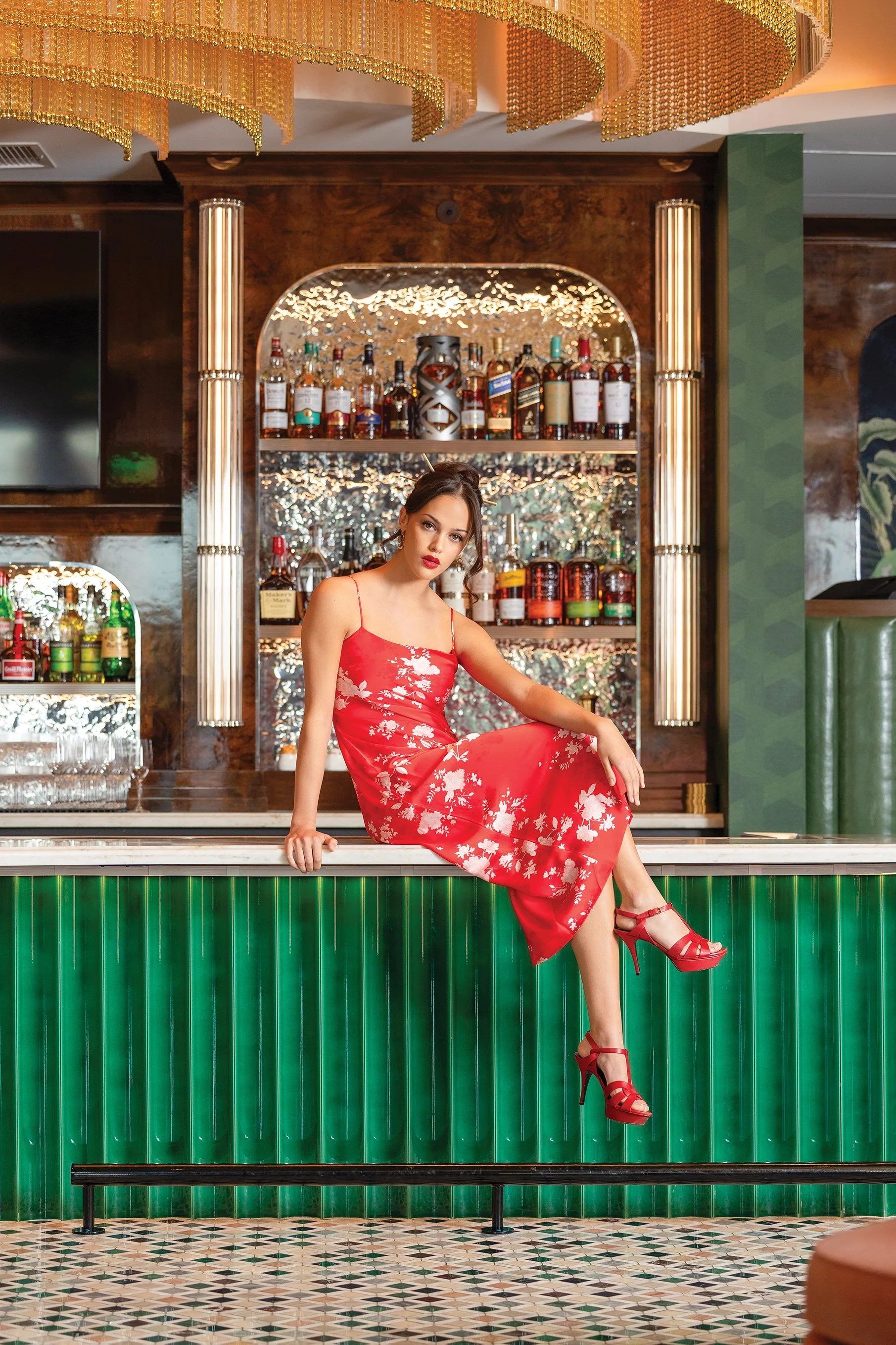   EARRINGS:  Gold hoops with pearls, $24.  DRESS:  Slip floral midi, Z Supply, $118. Both from RAE Boutique,  www.prettypleasecollective.com . 