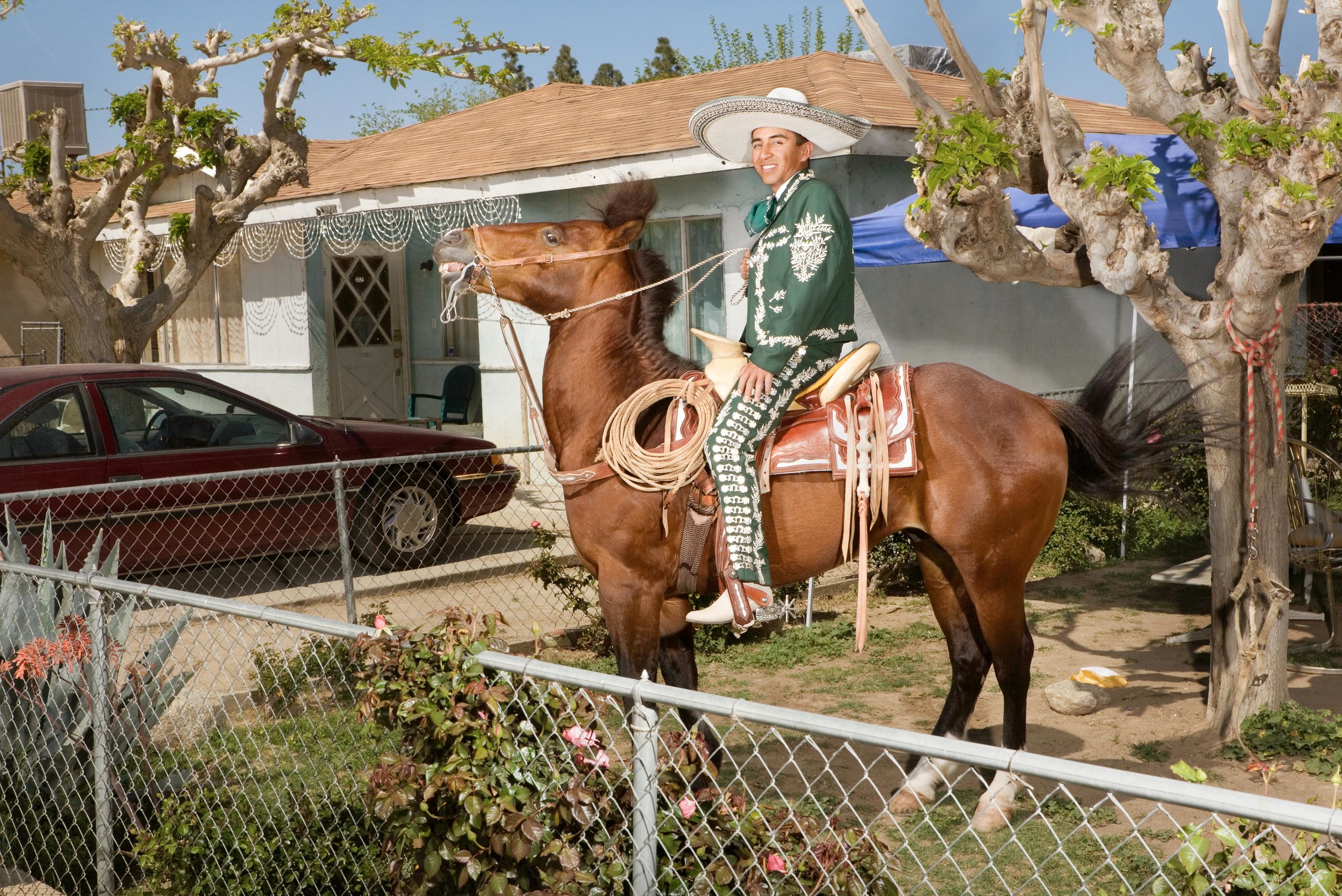  Jose Saldaña on Chapulín in Lost Hills, CA. March 28, 2009. From the series “Lost Hills.” 