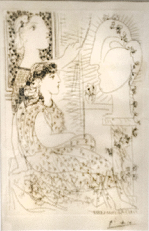 Sorry about the quality but the only image I had the impulse to photograph of the Picasso exhibit. A lovely drawing that fits right in with the Frida portraits, 