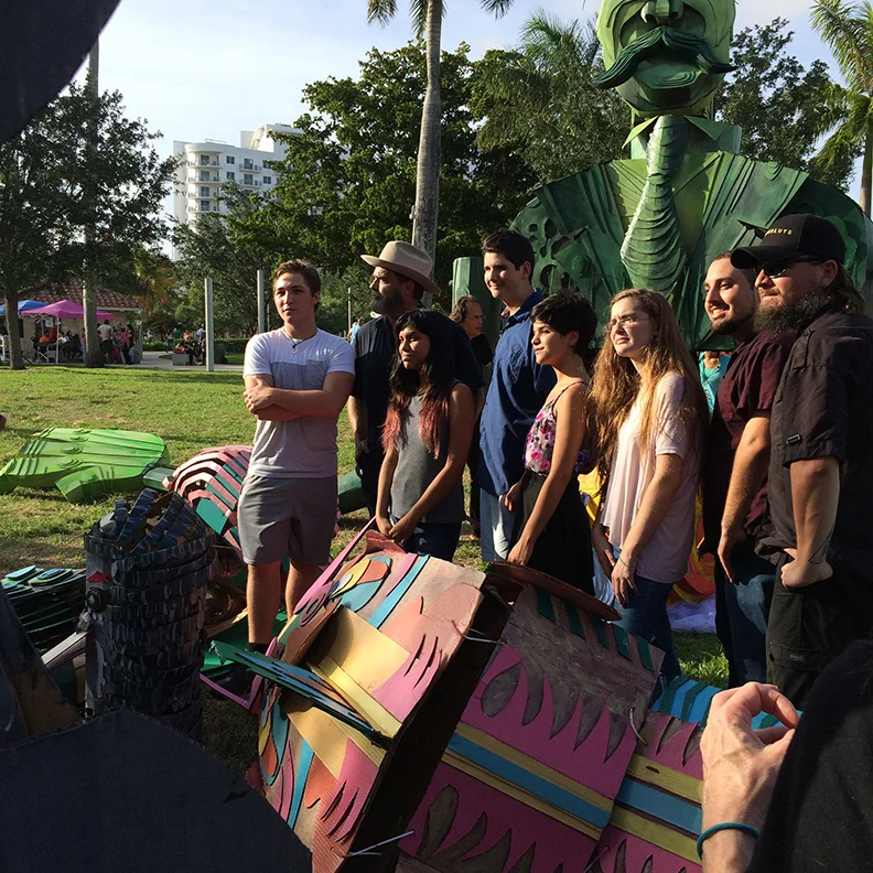 The end of a successful parade. Wayne (second from left) with students and faculty from New World School of the Arts, Miami who volunteered to help create and build the creatures pose for media after a successful event.. 