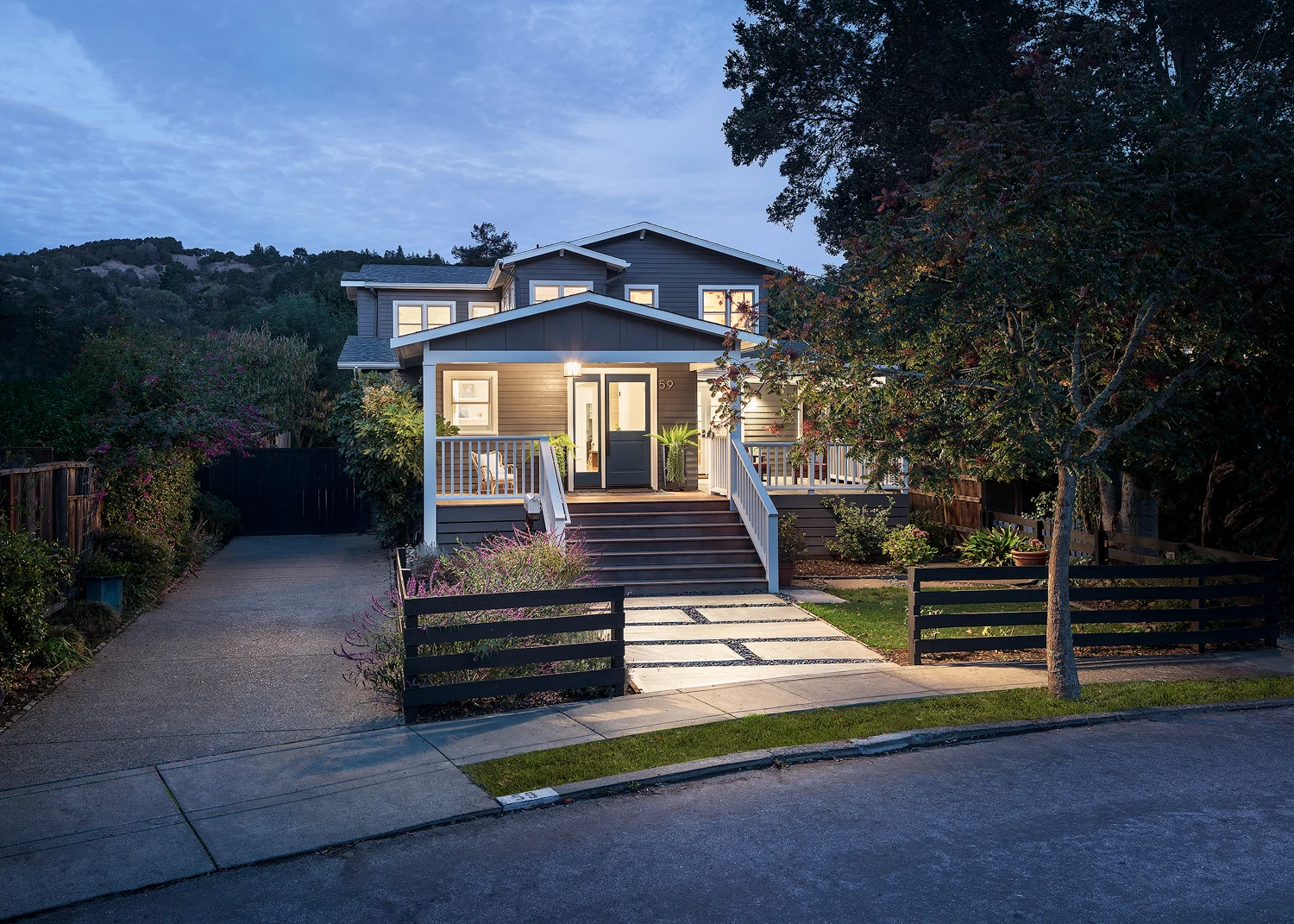 Here is the final image after some more color correction and exposure adjustments. More cloning was done to remove the houses on the left and the car in the neighbors driveway. 