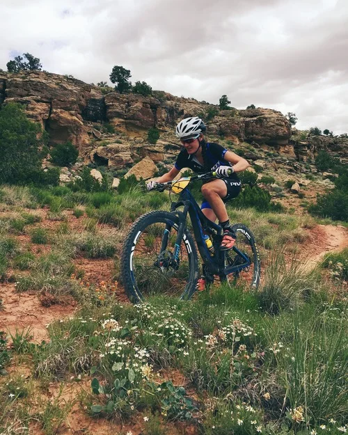 Despite vicious leg cramps for the last five miles of the race, I managed to crack a smile for my sister Ilana on Andy's Loop. The spectators were amazing all day!