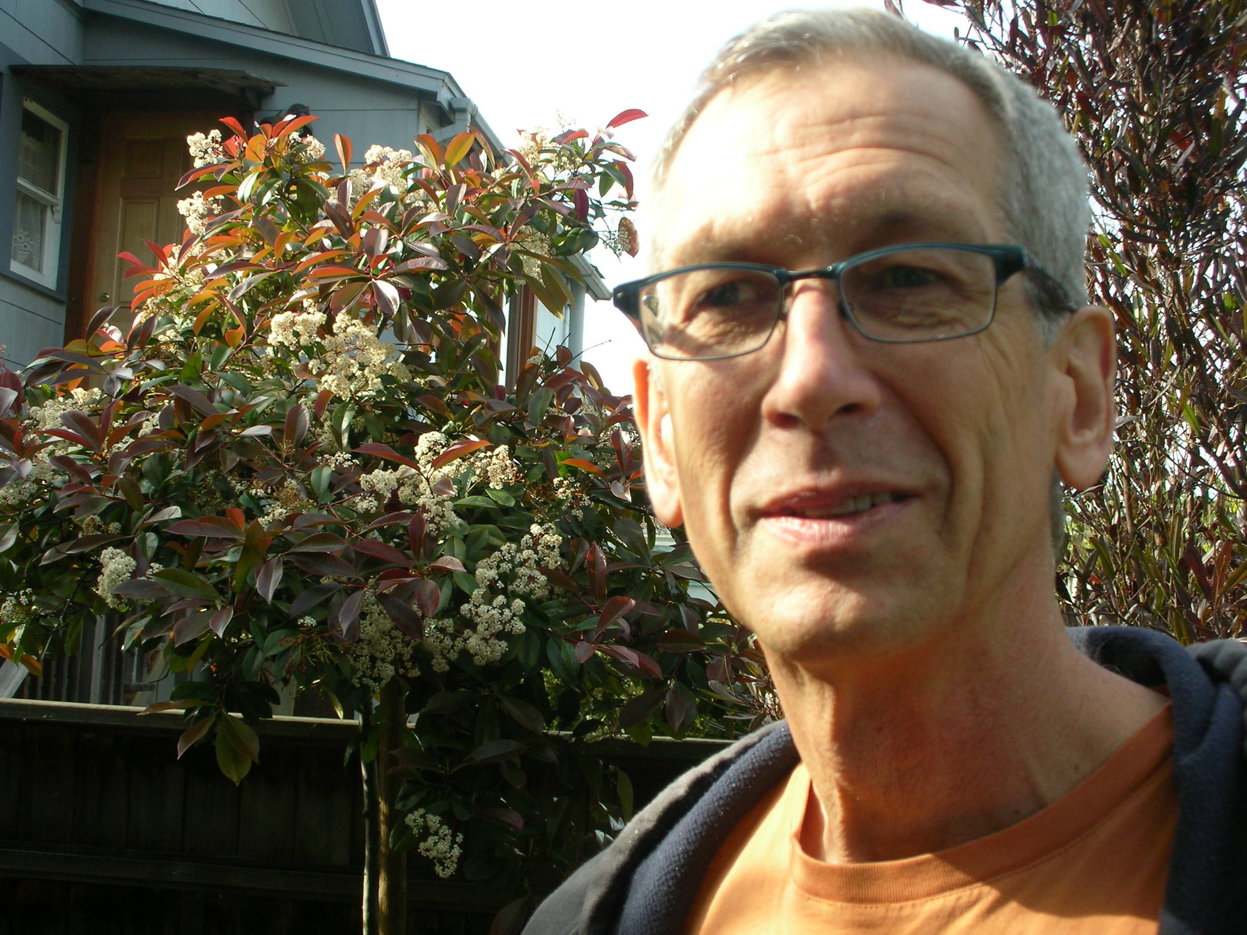 Kit Robinson photographed in his Berkeley back yard. LH