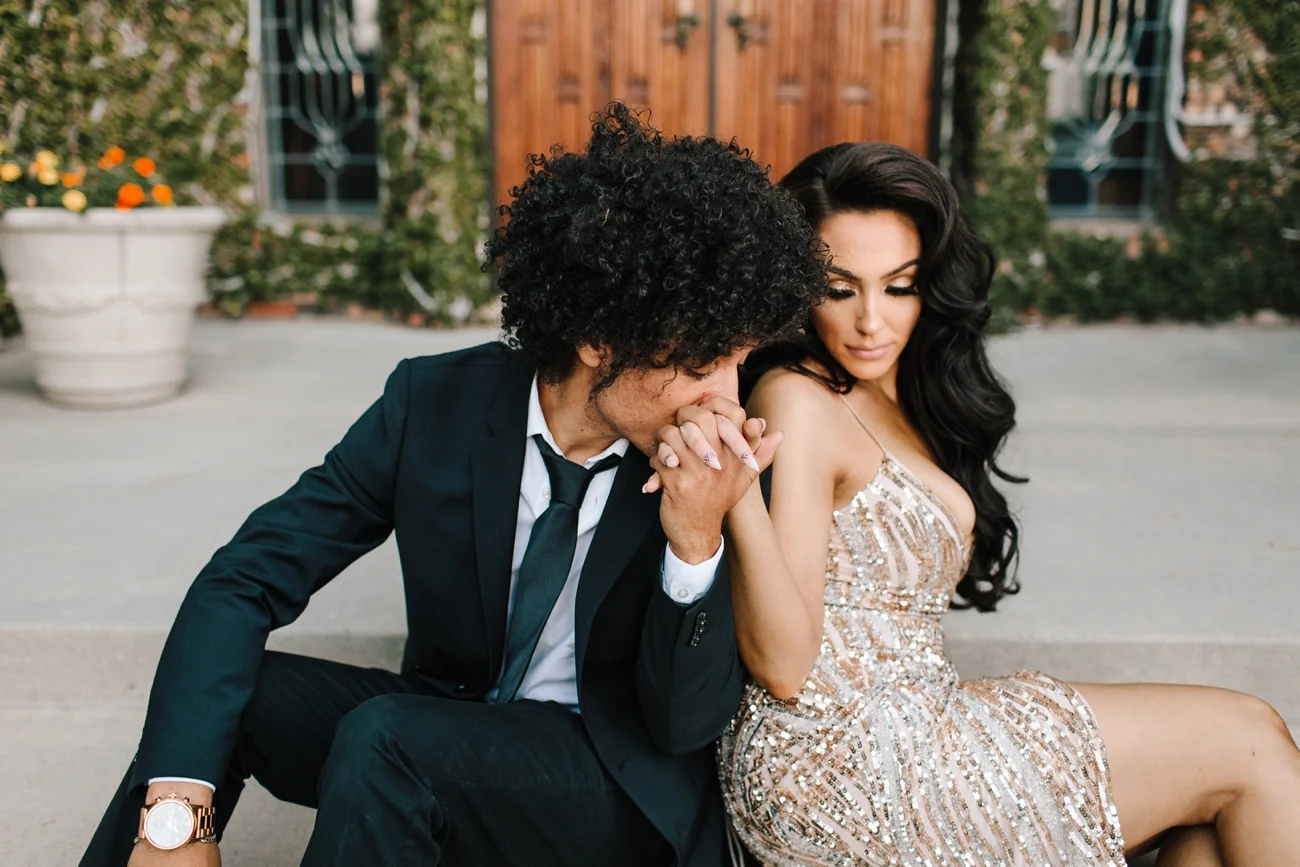 Interracial couple at their engagement session in Los Angeles at mansion