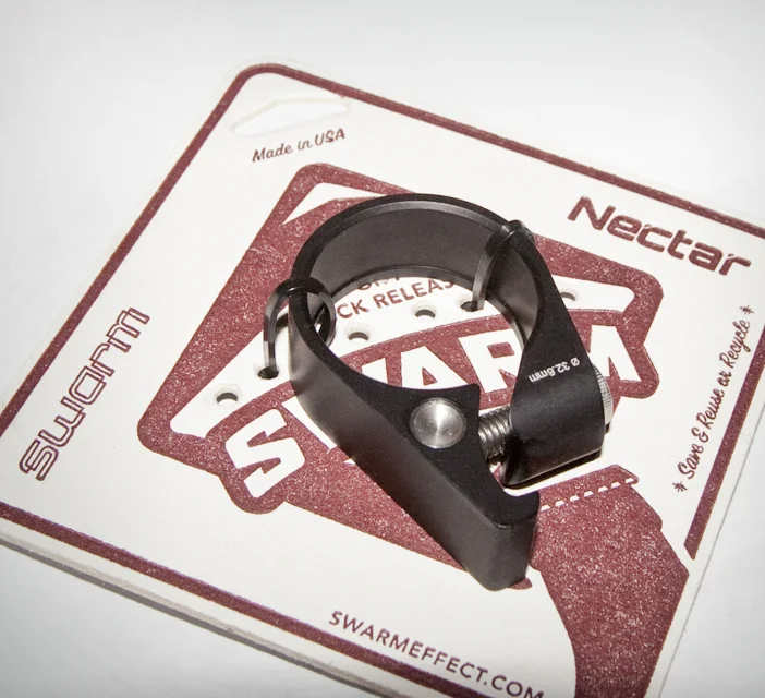 Nectar bottle opener seat clamp in packaging