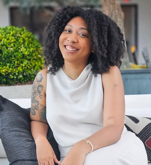 a professional headshot of Dr. Chanel Thomas