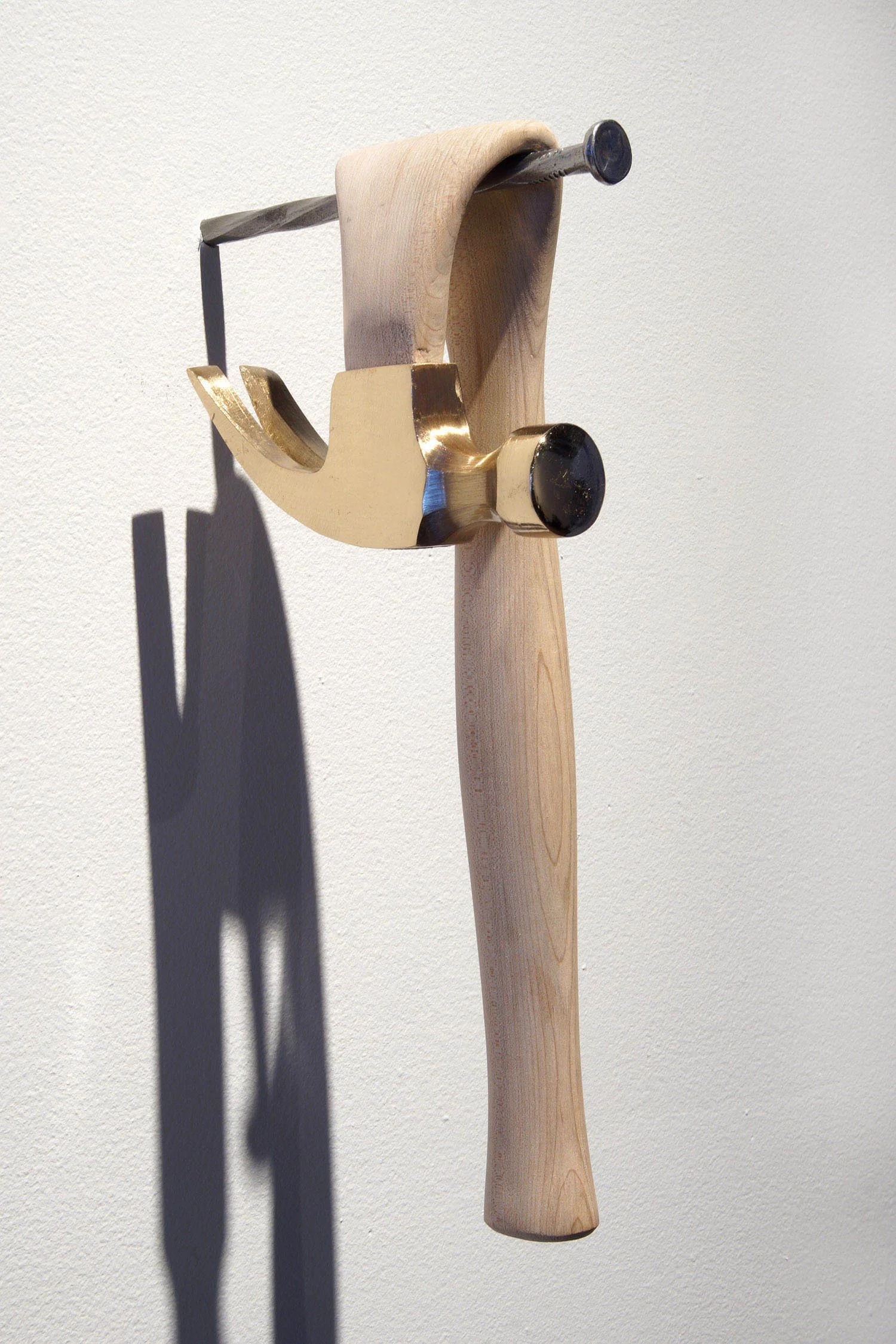 HAMMER 1 Cast bronze, hand carved hard maple, and 10" spike / 2017