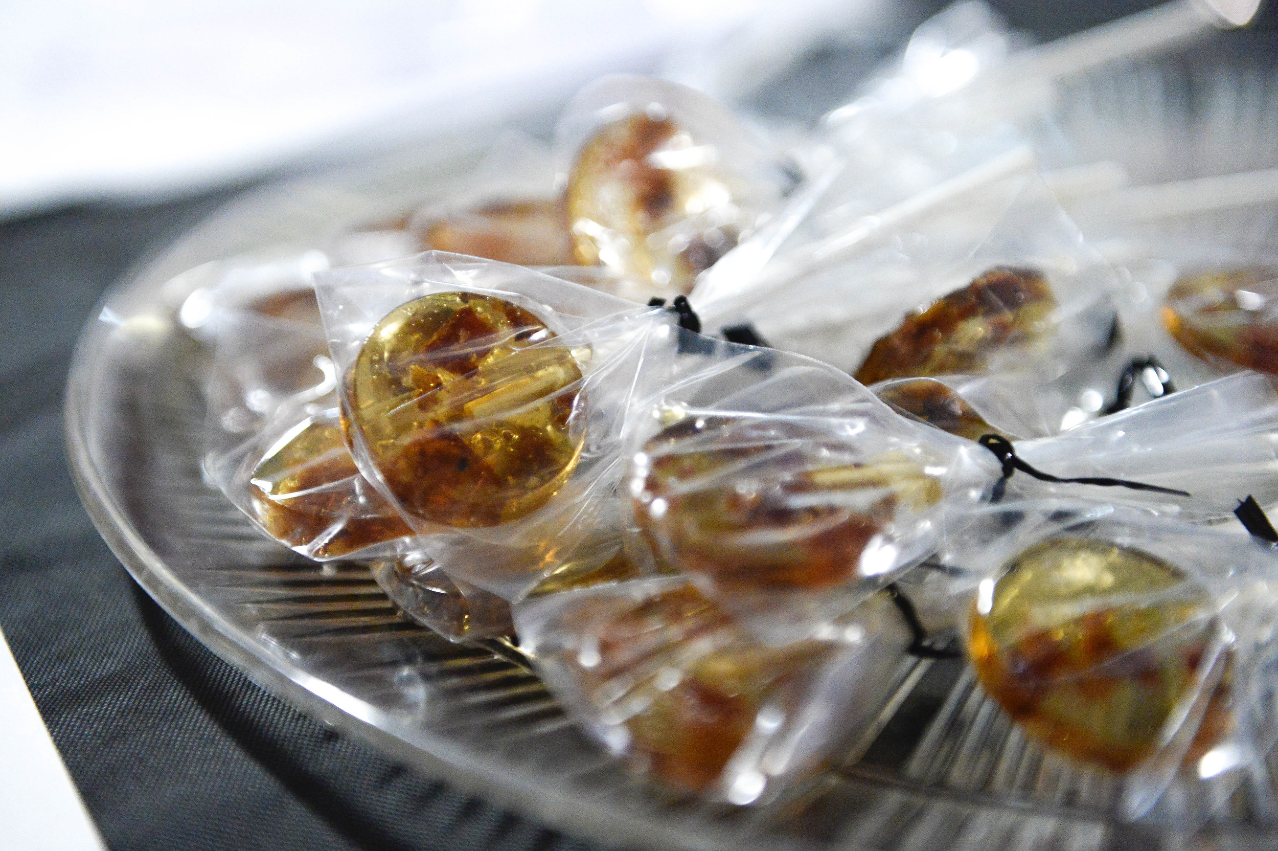   Jackie Kalinka, 28, made bacon maple lollipops for the Harley Davidson booth at BaconFest.&nbsp;  