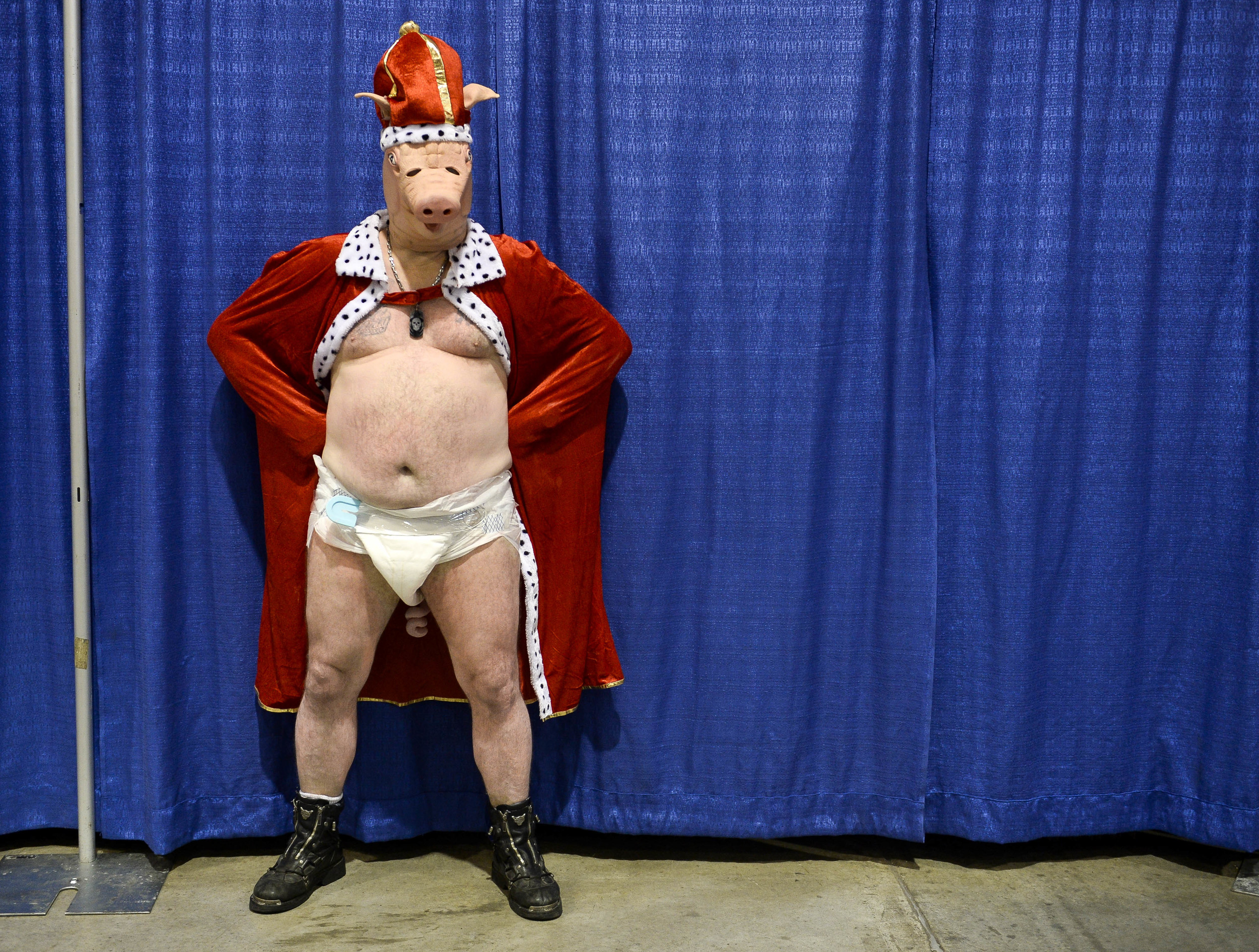   John Marshoff, 45, poses for pictures&nbsp;BaconFest. Marshoff was selected as bacon king at the bacon king and queen contest held at the Harley Davidson in St. Joe, Mo., on Sept. 20. His talent was juggling oranges.&nbsp;  