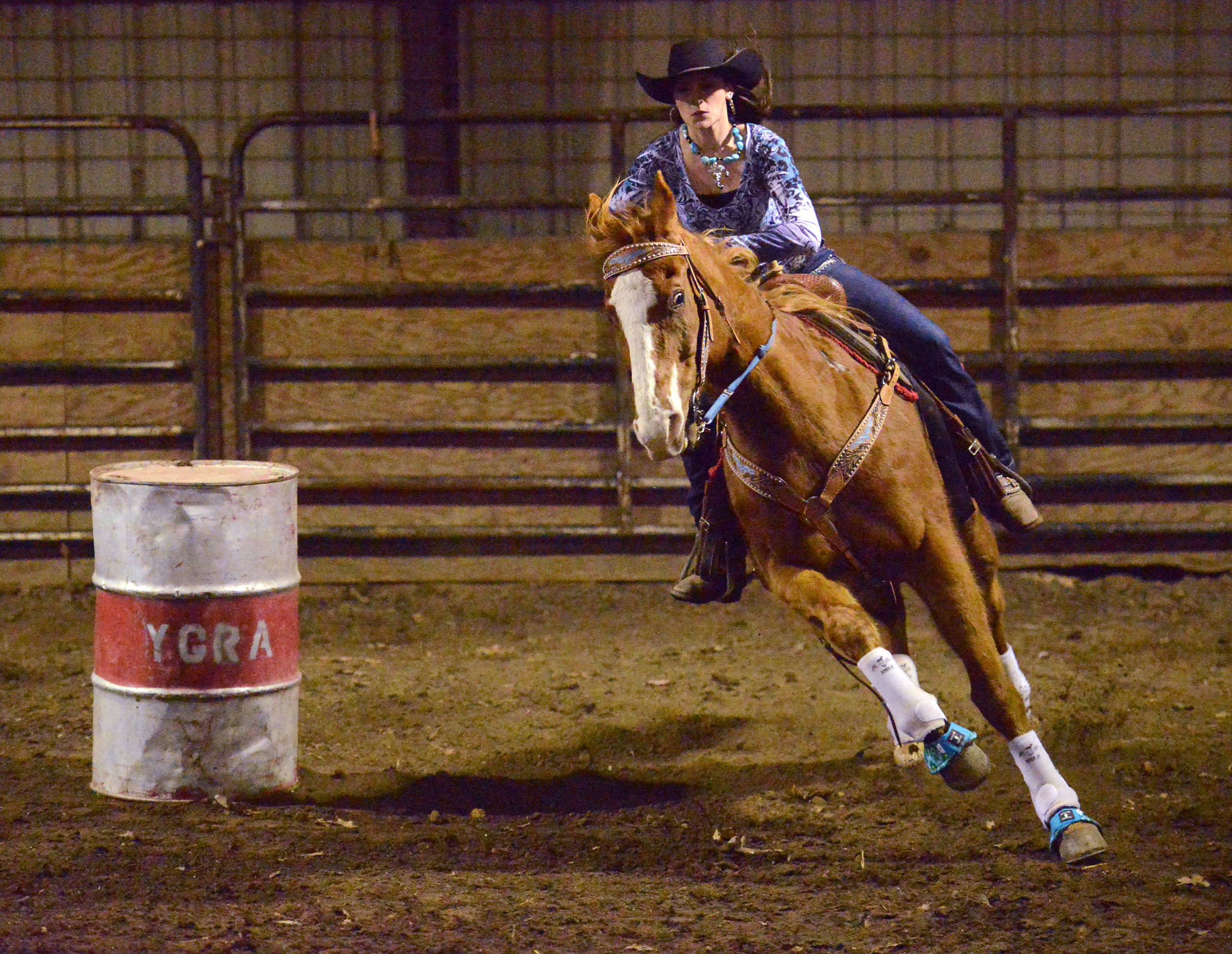   Amee Riley races on her horse Banjo at a rodeo in Eldon, Mo. Amee won first place and a belt buckle at the rodeo for having the most points in her age division. "I don't really have spare time," she says. "I just ride my horses."  