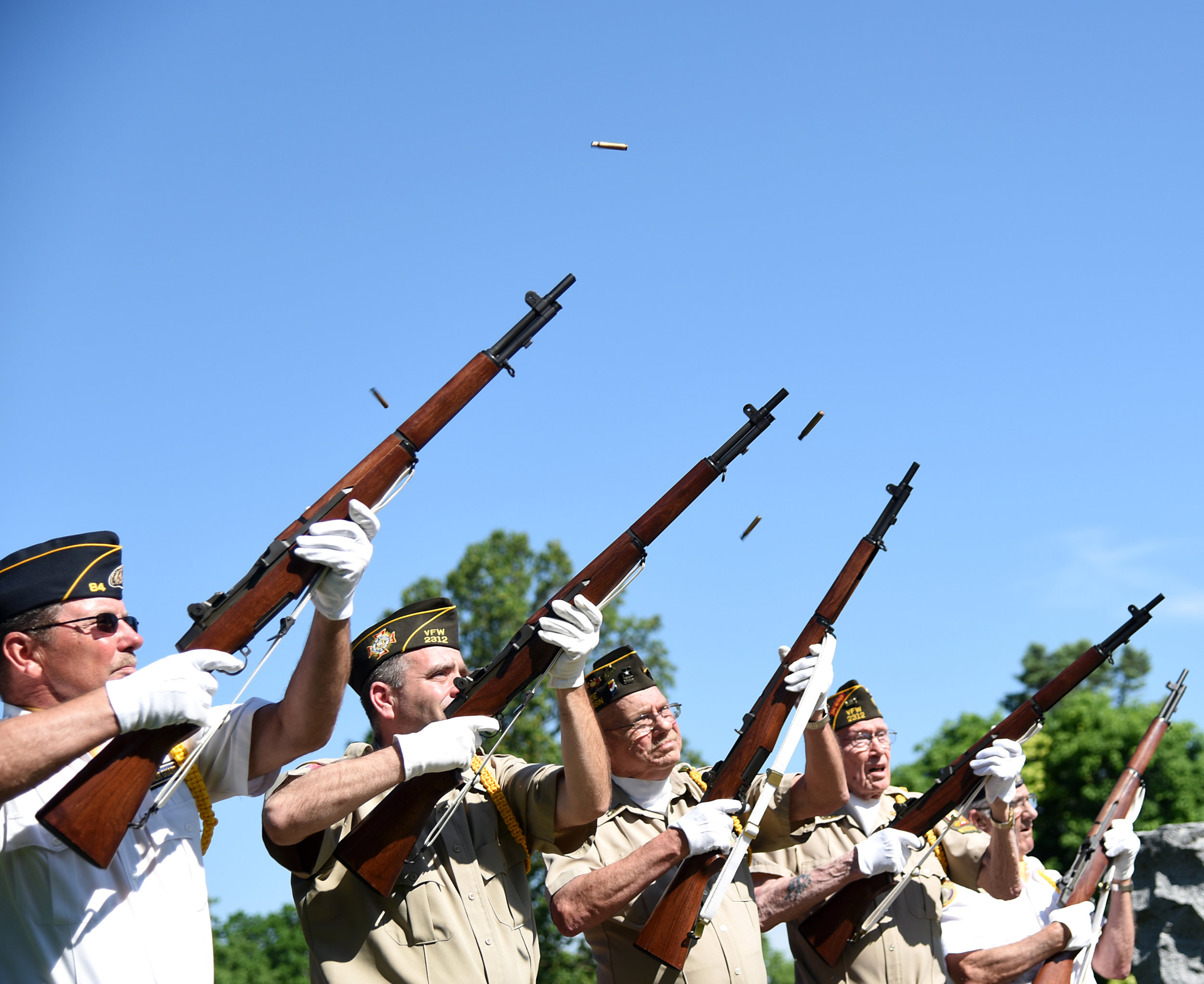 American Legion members Jim Moser, Lucian Lemak, Bill Haffele, Alvie Riese, and Al Buri shoot during the Memorial Day Ceremony at the Cemetery May 30, 2016.