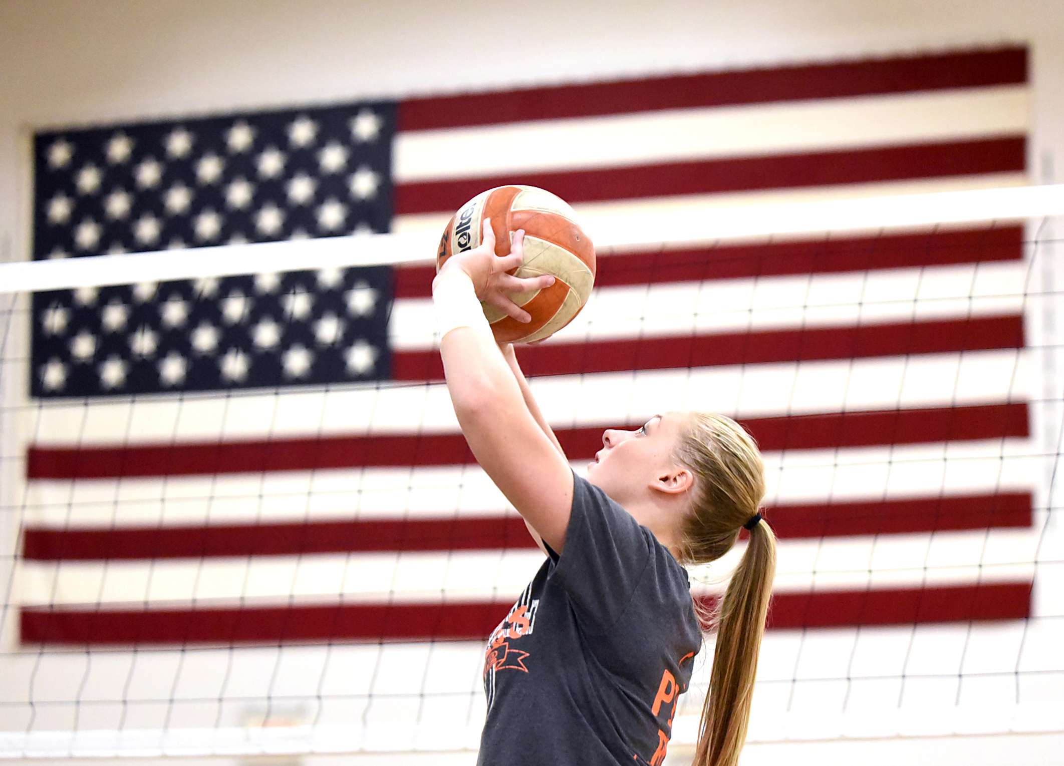  Kayla Butler-Paulson sets the ball during volleyball practice at Argyle High School Oct. 13, 2015. 