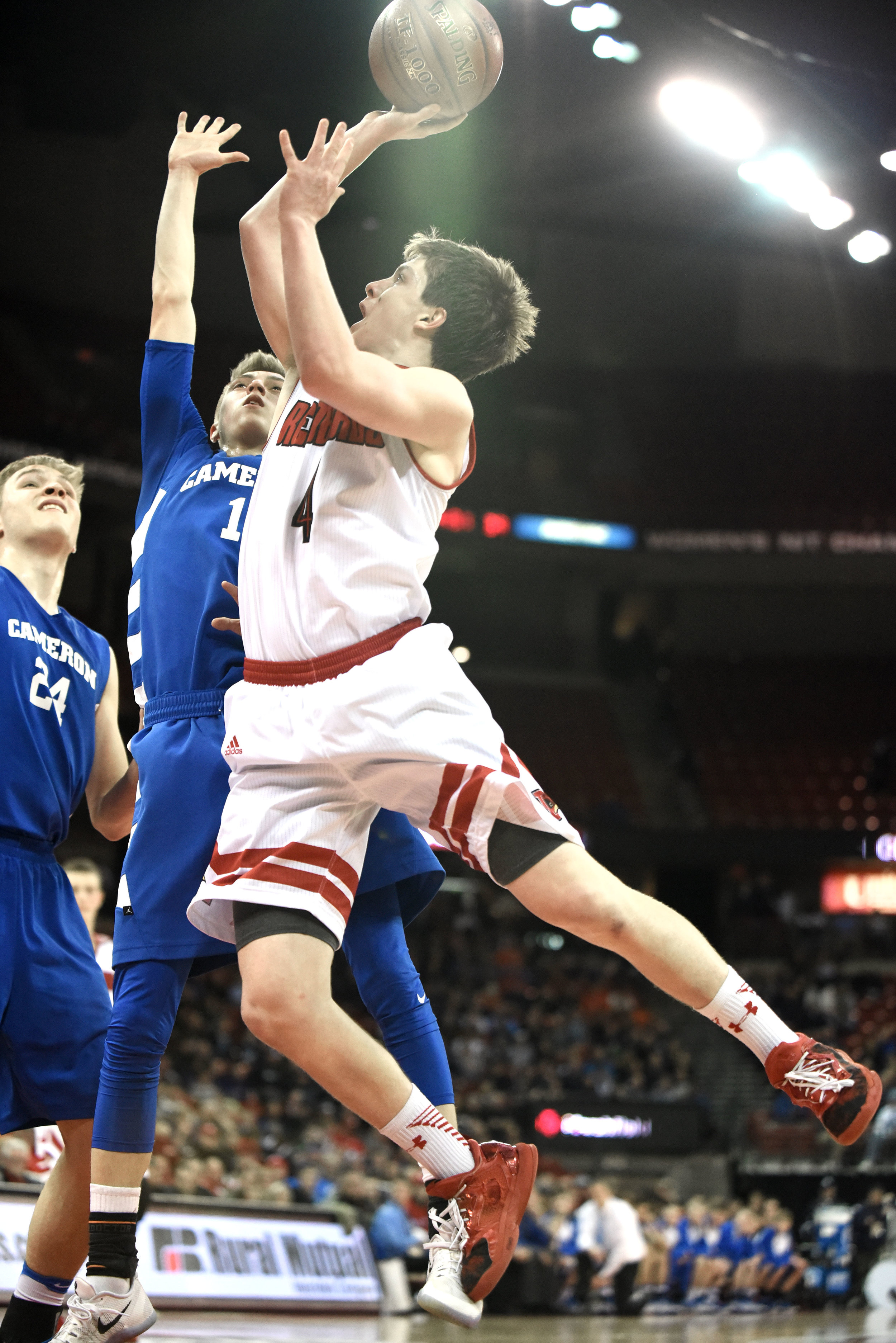  Darlington senior Ryan Glendenning scores against Cameron during their Division 4 State Semifinal game at the Kohl Center March 16, 2017. 