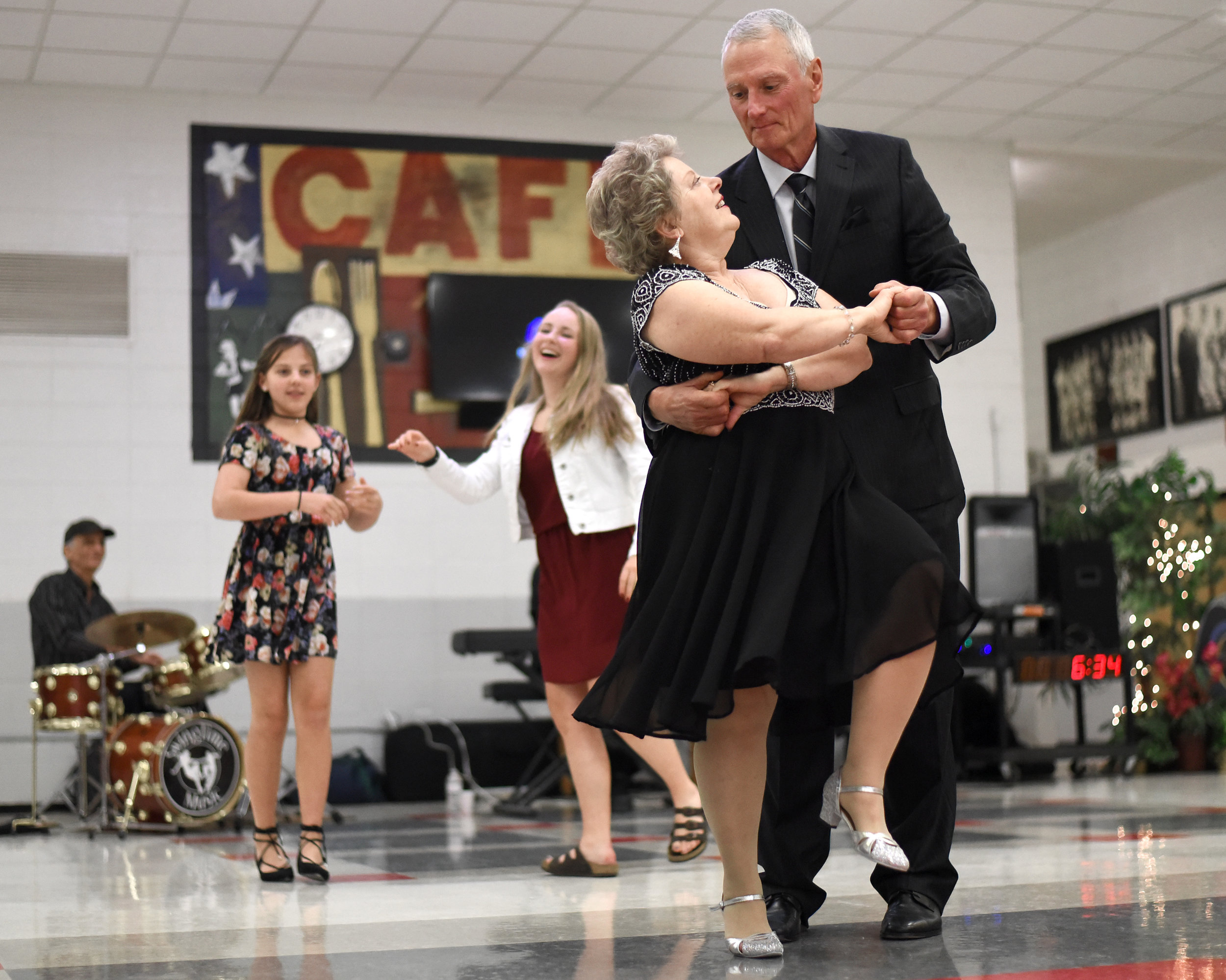  Leanne and John Namio, of Freeport, share a dance during the Senior Citizen Prom at Monroe High School May 6, 2017. The Namios enjoy dancing and often go to dances at Turner Hall which is how they found out about the prom. The two have been married 