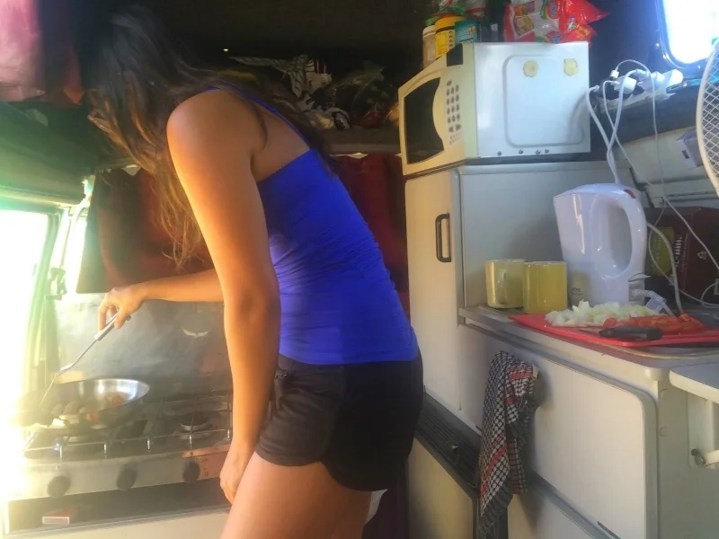 Cooking breakfast in the camper. Photo Credit: Cody Davis