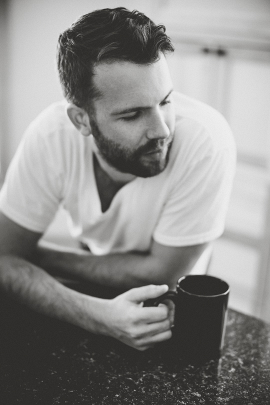 Daniel Alkato holding coffee mug