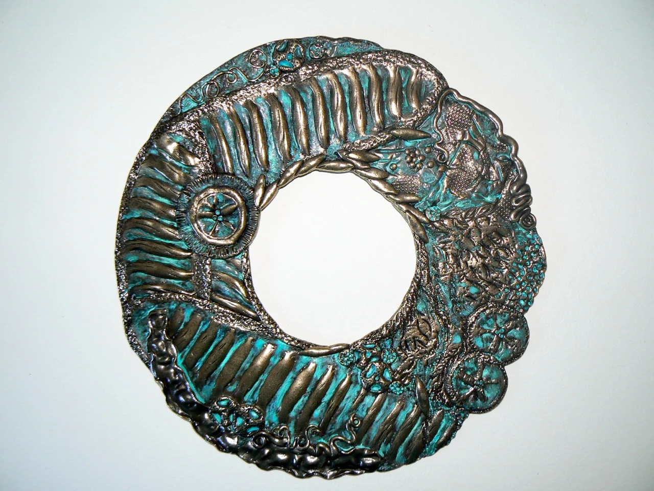 63 Seed Circle 2010 26cm cast,plated&patimated pewter.jpg