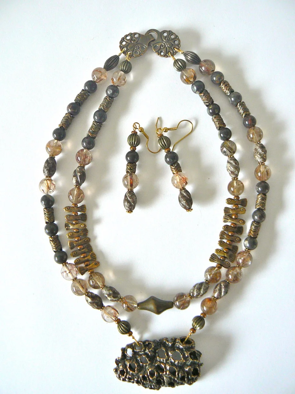 Neckpiece and earring set