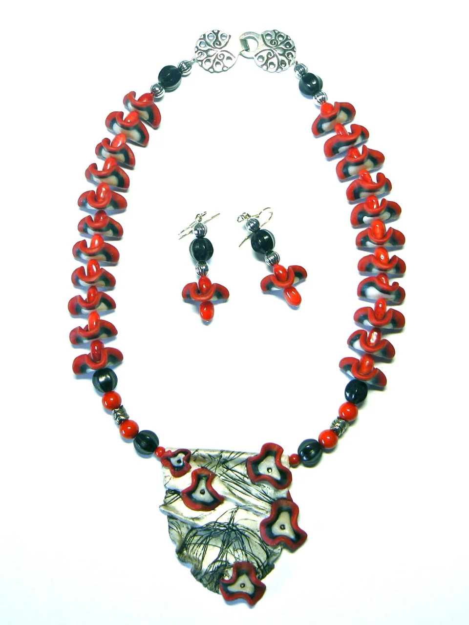 Neckpiece and earring set