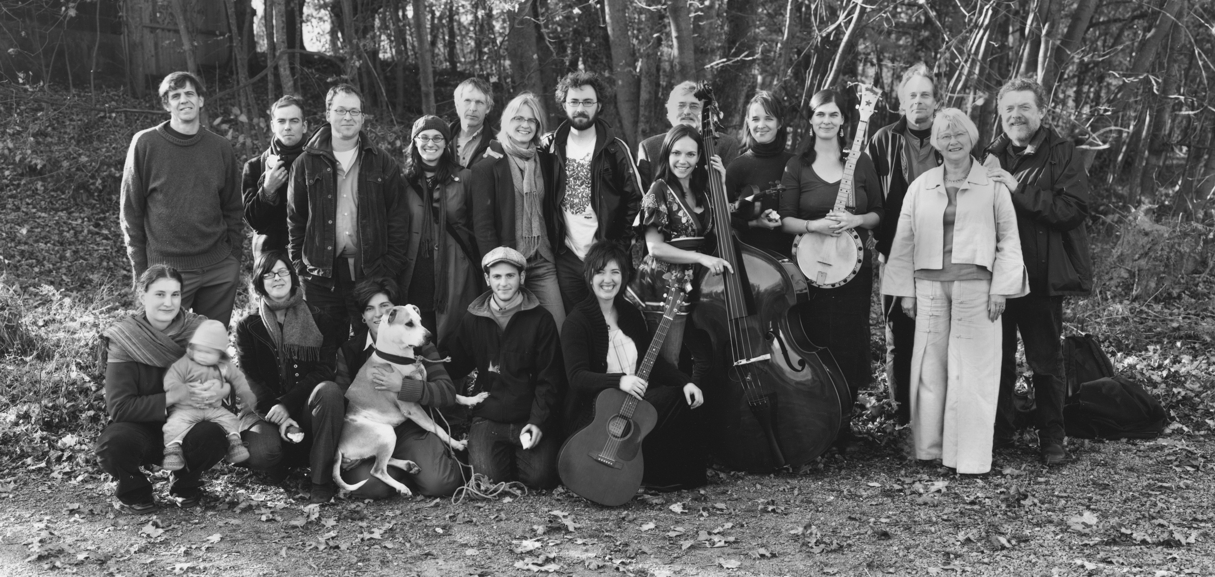 White Salt Mountain: A Gathering of Poets (Sackville, NB; 2008). Participating poets included Rob Winger (back row, third from the left), Anita Lahey (back row, fourth from the left), Amanda Jernigan (back row, sixth from the left), Peter Sanger (back row, just right of centre, behind the double bass), Allan Cooper (third from the right), and Harry Thurston (far right). The gathering was organized by Janna Graham (bottom row, third from the left, with the apple). Photograph by Thaddeus Holownia, http://www.anchoragepress.ca