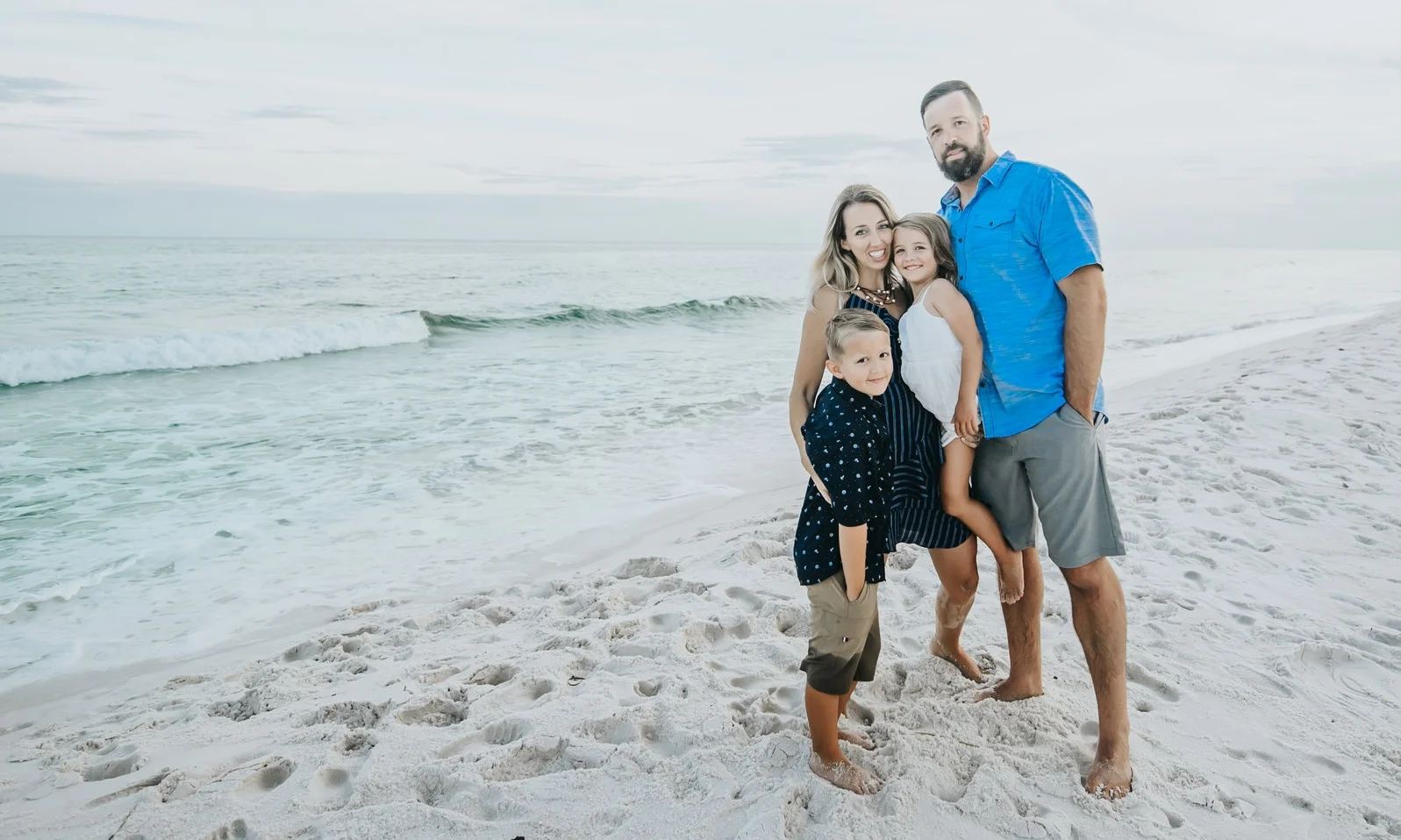 April with her husband Nathan, son JD, and daughter Marilyn, enjoying beautiful Pensacola Beach.