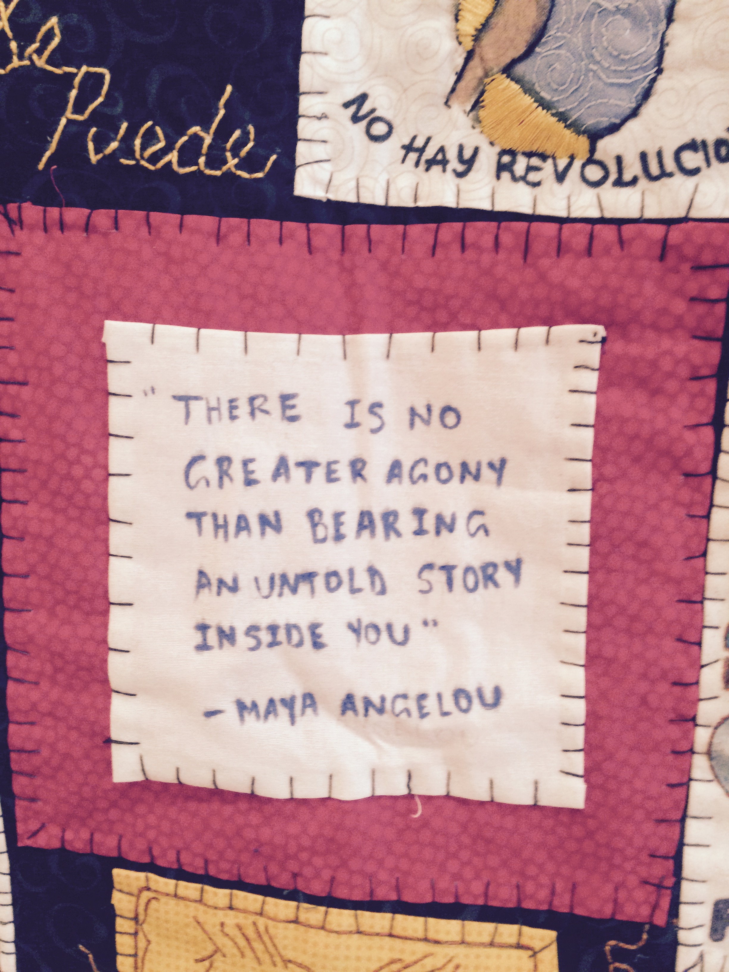A close-up of a quilt in the CoV4 exhibition room.