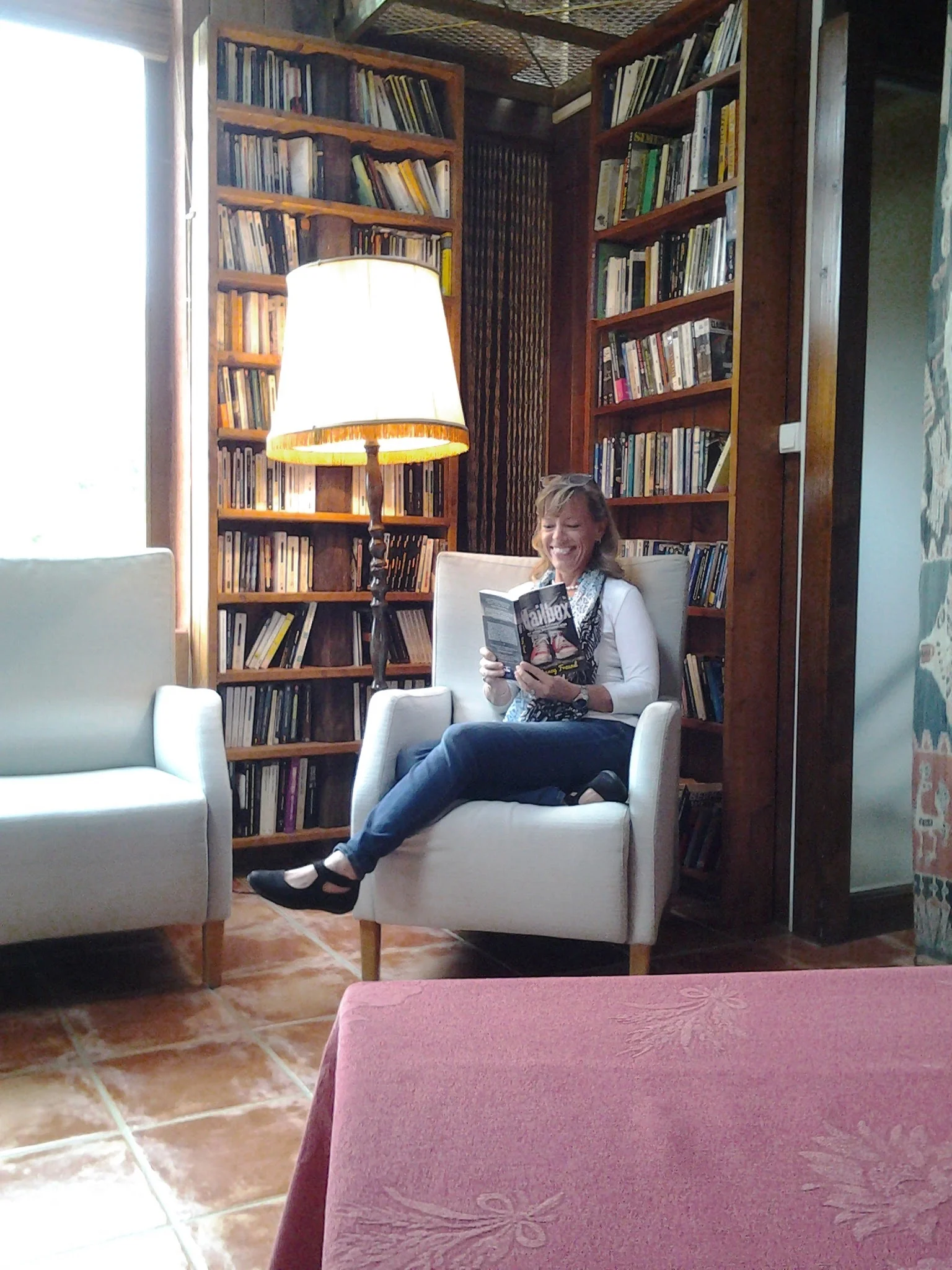 Nancy Freund reading from her novel Mailbox at one of the nightly readings during L'ATELIER 2015. 