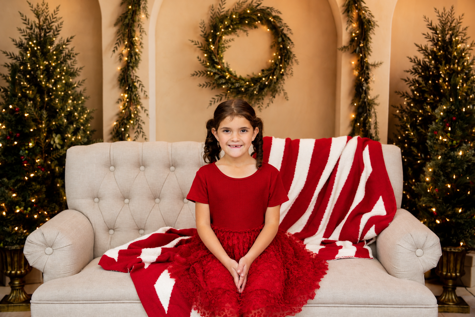 Cozy Christmas Portrait in Red Dress.png