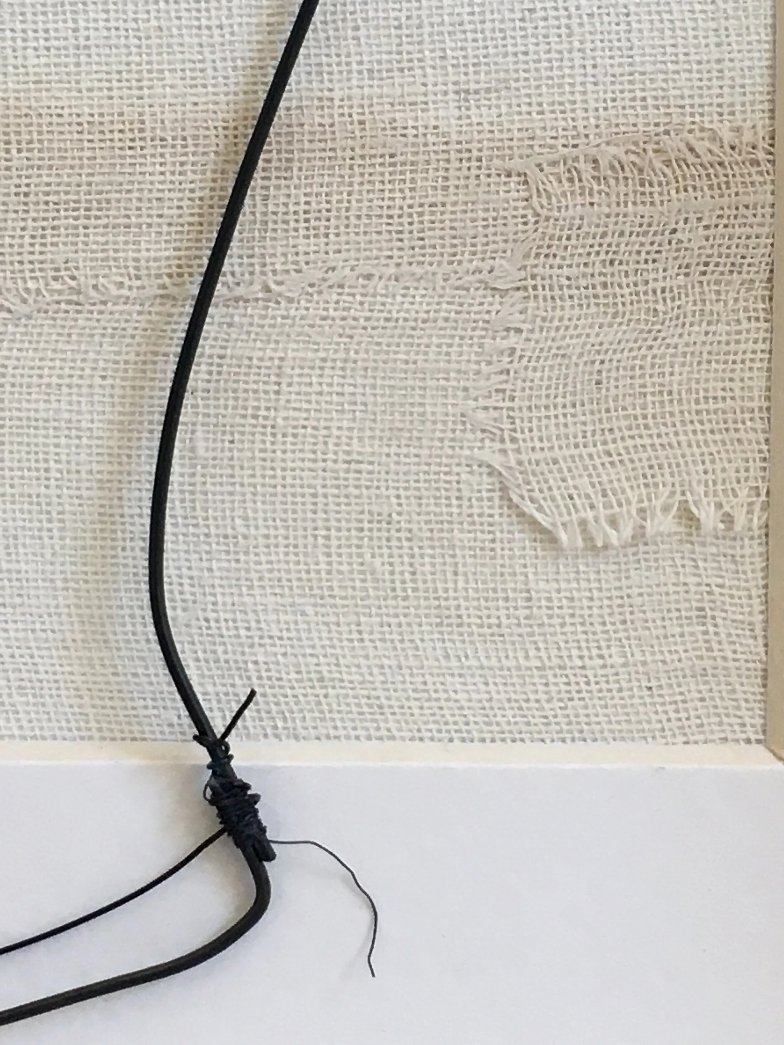 Detail of the brace’s lower edge with frayed “thread” (intentionally placed). Hand formed and assembled using annealed steel wire. .
