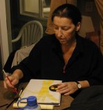 Photo of Natasha painting taken by taken by Kara Wilde Kara@creativehealing.org
