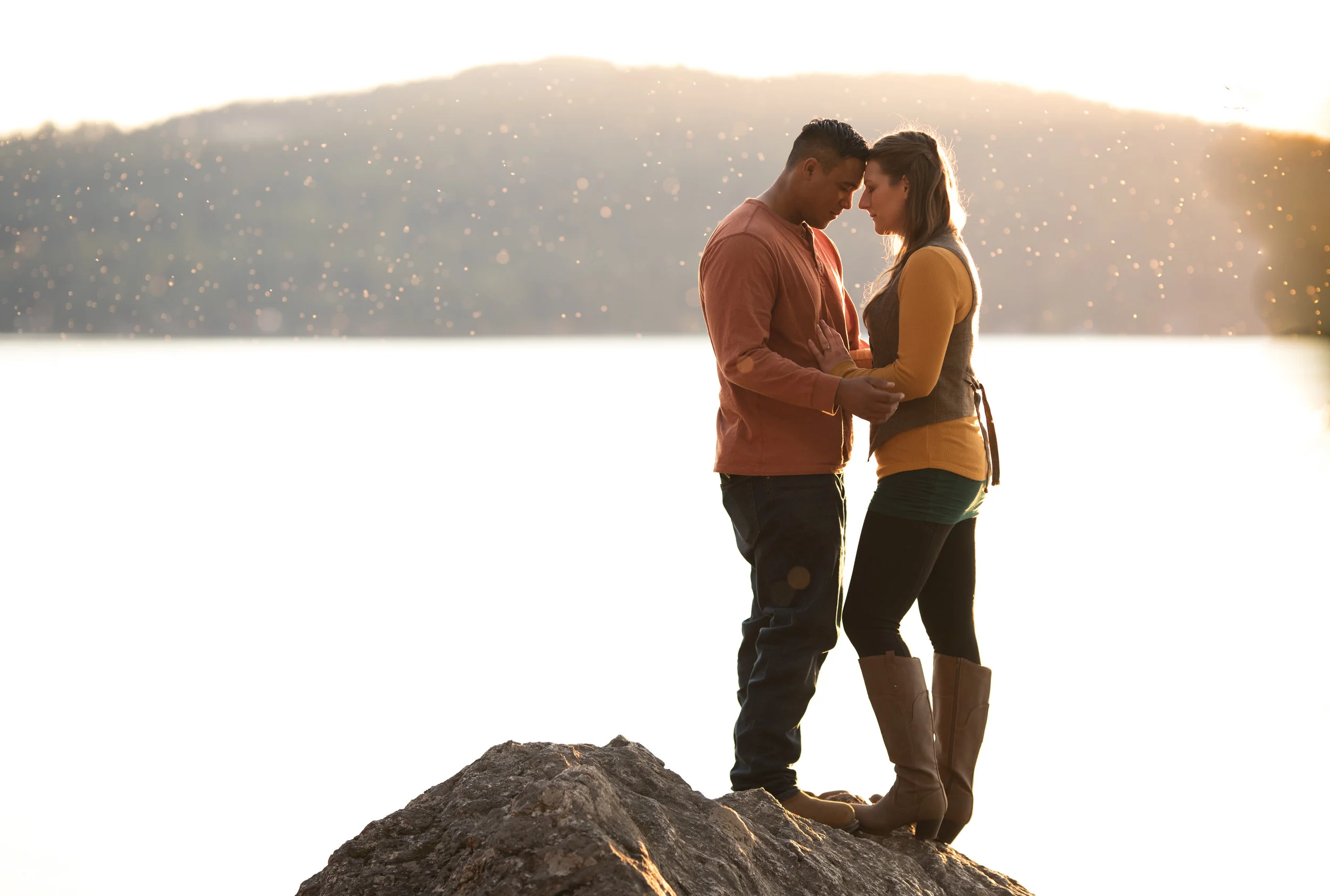 engaged couple hugging in spokane washington