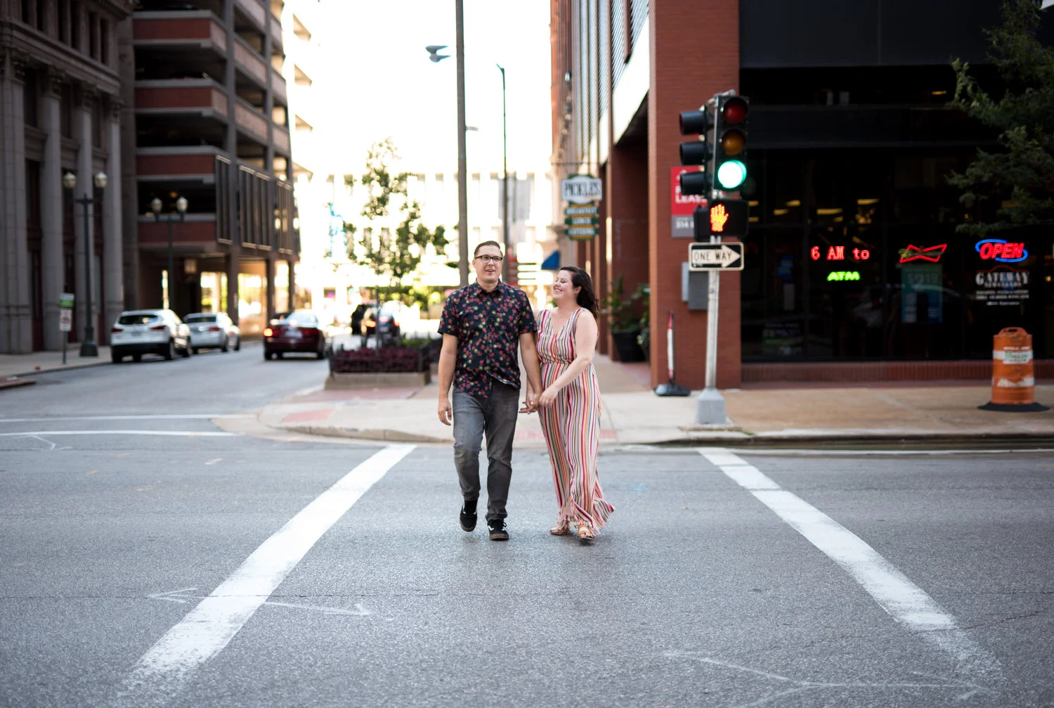 engaged couple walking in st louis missouri